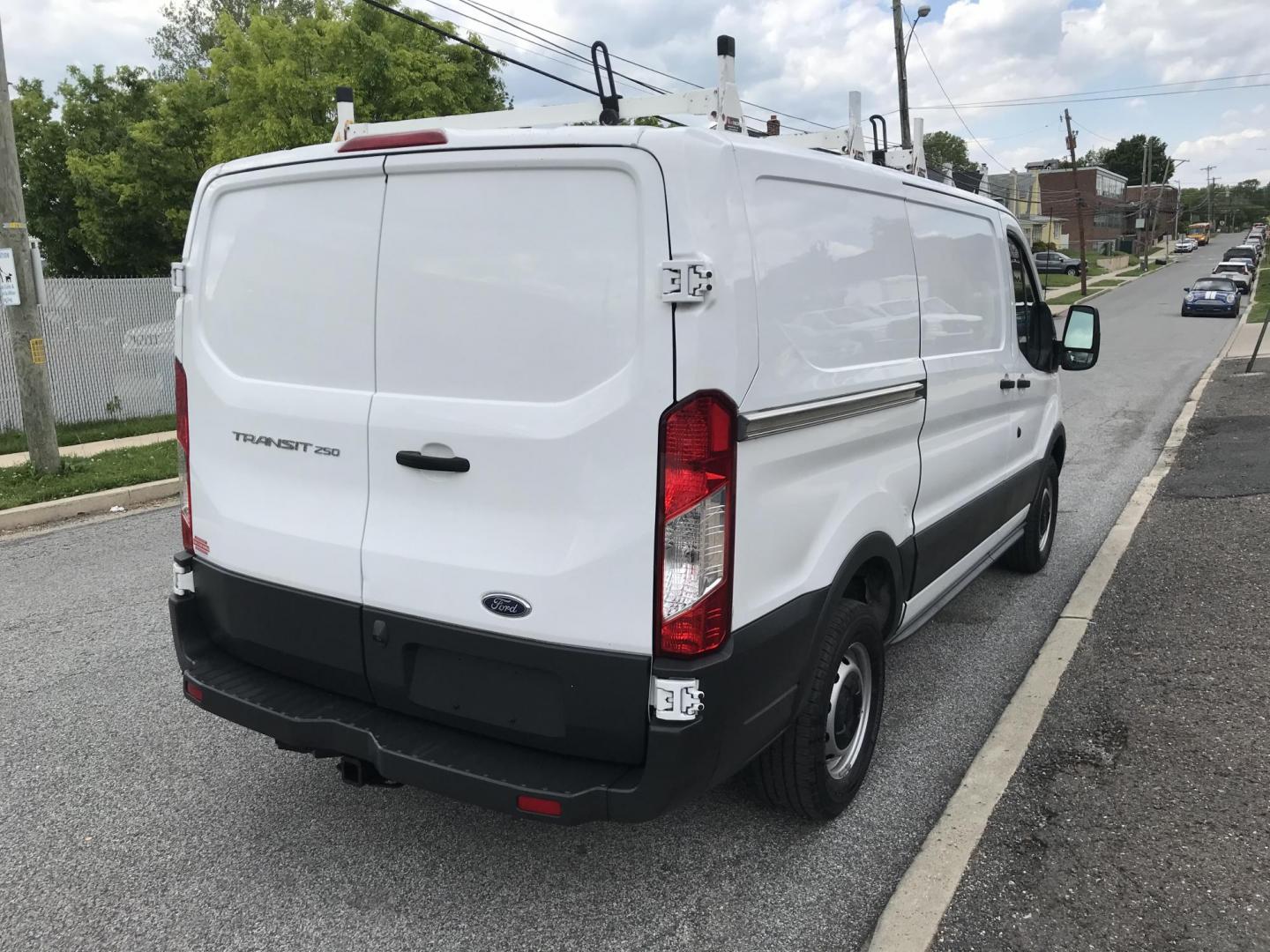2017 White /Gray Ford Transit 250 Van Low Roof w/Sliding Pass. 130-in. WB (1FTYR1YM0HK) with an 3.7L V6 DOHC 24V engine, 6A transmission, located at 577 Chester Pike, Prospect Park, PA, 19076, (610) 237-1015, 39.886154, -75.302338 - 2017 Ford Transit 250: Ladder racks, shelving, no side or rear windows, backup camera, partition, FLEET MAINTAINED, runs LIKE NEW! This vehicle comes inspected and has been given a bumper to bumper safety check. It is very clean, reliable, and well maintained. We offer a unique pay plan that is k - Photo#4