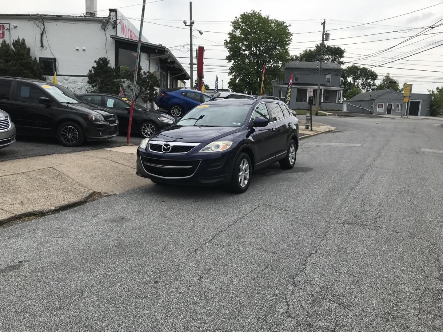 2012 Blue /Tan Mazda CX-9 Touring AWD (JM3TB3CV5C0) with an 3.7L V6 DOHC 24V engine, 6-Speed Automatic transmission, located at 577 Chester Pike, Prospect Park, PA, 19076, (610) 237-1015, 39.886154, -75.302338 - 2012 Mazda CX-9: AWD, 3rd row seating, sunroof, backup camera, new PA inspection, SUPER CLEAN, runs LIKE NEW! This vehicle comes inspected and has been given a bumper to bumper safety check. It is very clean, reliable, and well maintained. We offer a unique pay plan that is known for being the ea - Photo#1