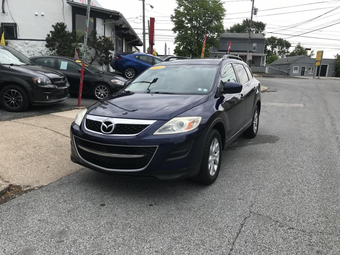 2012 Blue /Tan Mazda CX-9 Touring AWD (JM3TB3CV5C0) with an 3.7L V6 DOHC 24V engine, 6-Speed Automatic transmission, located at 577 Chester Pike, Prospect Park, PA, 19076, (610) 237-1015, 39.886154, -75.302338 - 2012 Mazda CX-9: AWD, 3rd row seating, sunroof, backup camera, new PA inspection, SUPER CLEAN, runs LIKE NEW! This vehicle comes inspected and has been given a bumper to bumper safety check. It is very clean, reliable, and well maintained. We offer a unique pay plan that is known for being the ea - Photo#2