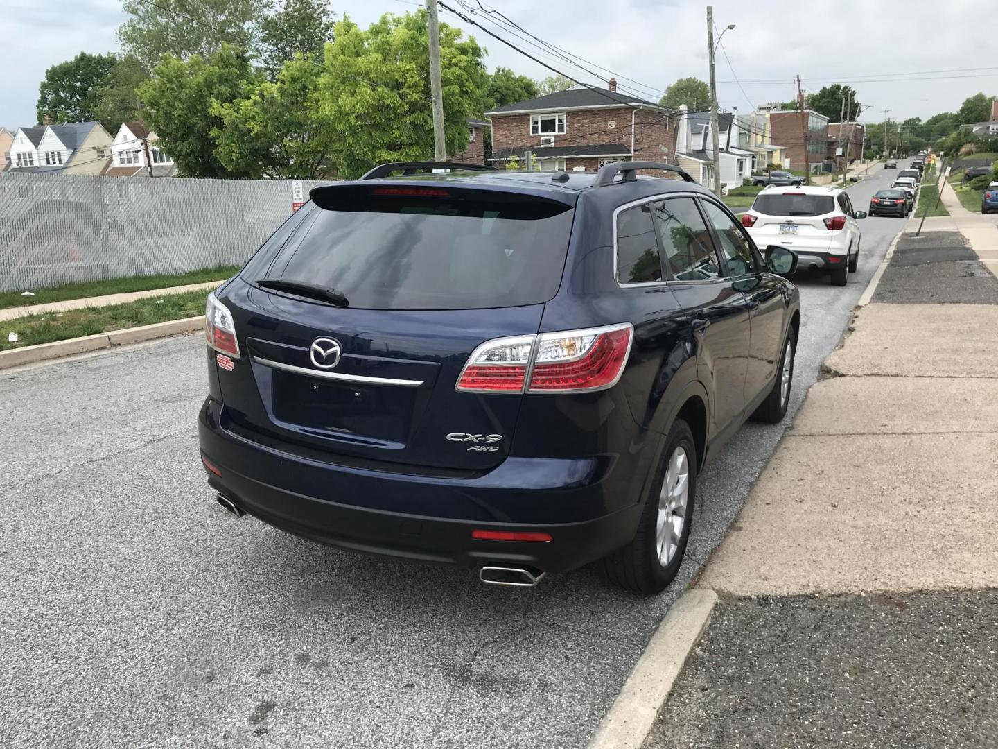 2012 Blue /Tan Mazda CX-9 Touring AWD (JM3TB3CV5C0) with an 3.7L V6 DOHC 24V engine, 6-Speed Automatic transmission, located at 577 Chester Pike, Prospect Park, PA, 19076, (610) 237-1015, 39.886154, -75.302338 - 2012 Mazda CX-9: AWD, 3rd row seating, sunroof, backup camera, new PA inspection, SUPER CLEAN, runs LIKE NEW! This vehicle comes inspected and has been given a bumper to bumper safety check. It is very clean, reliable, and well maintained. We offer a unique pay plan that is known for being the ea - Photo#4