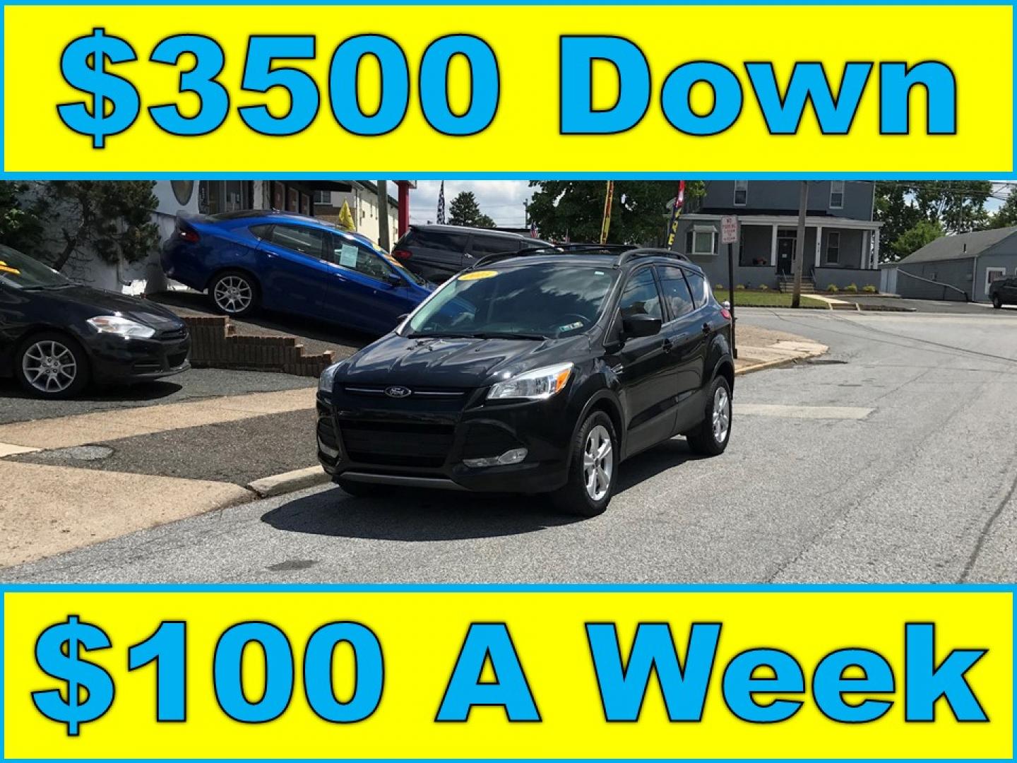 2015 Black /Gray Ford Escape SE 4WD (1FMCU9GX7FU) with an 1.6L L4 DOHC 16V engine, 6-Speed Automatic transmission, located at 577 Chester Pike, Prospect Park, PA, 19076, (610) 237-1015, 39.886154, -75.302338 - 2015 Ford Escape SE: Only 79k miles, 4x4, navigation system, backup camera, SUPER CLEAN, runs LIKE NEW! This vehicle comes inspected and has been given a bumper to bumper safety check. It is very clean, reliable, and well maintained. We offer a unique pay plan that is known for being the easiest - Photo#0