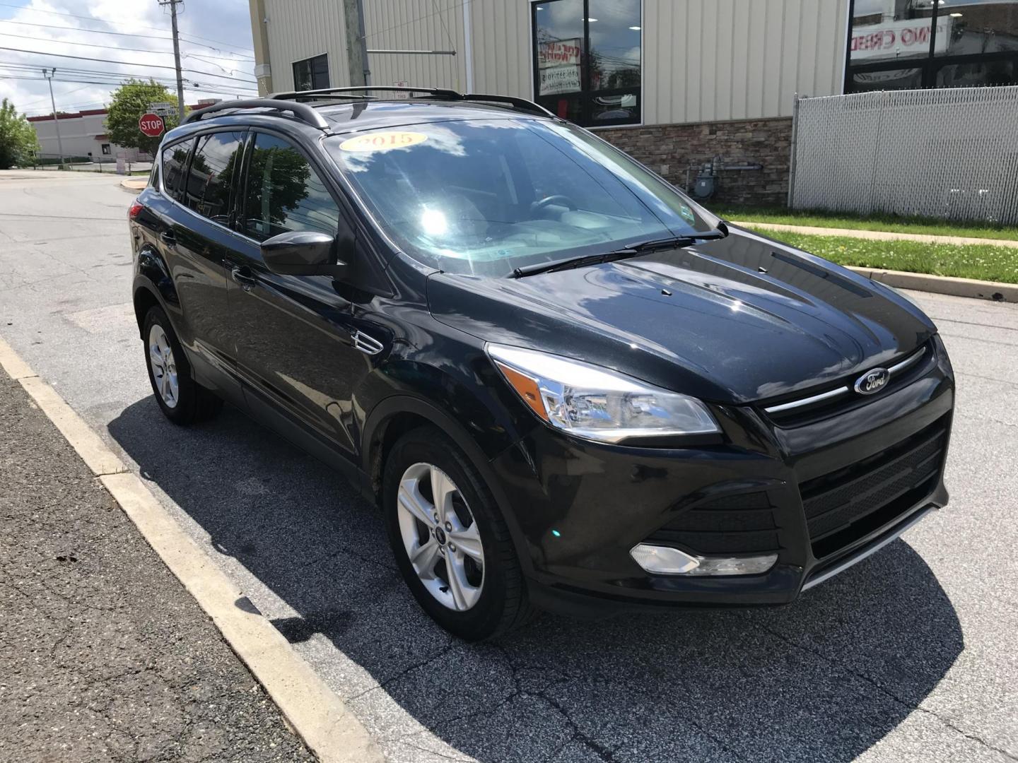 2015 Black /Gray Ford Escape SE 4WD (1FMCU9GX7FU) with an 1.6L L4 DOHC 16V engine, 6-Speed Automatic transmission, located at 577 Chester Pike, Prospect Park, PA, 19076, (610) 237-1015, 39.886154, -75.302338 - 2015 Ford Escape SE: Only 79k miles, 4x4, navigation system, backup camera, SUPER CLEAN, runs LIKE NEW! This vehicle comes inspected and has been given a bumper to bumper safety check. It is very clean, reliable, and well maintained. We offer a unique pay plan that is known for being the easiest - Photo#3