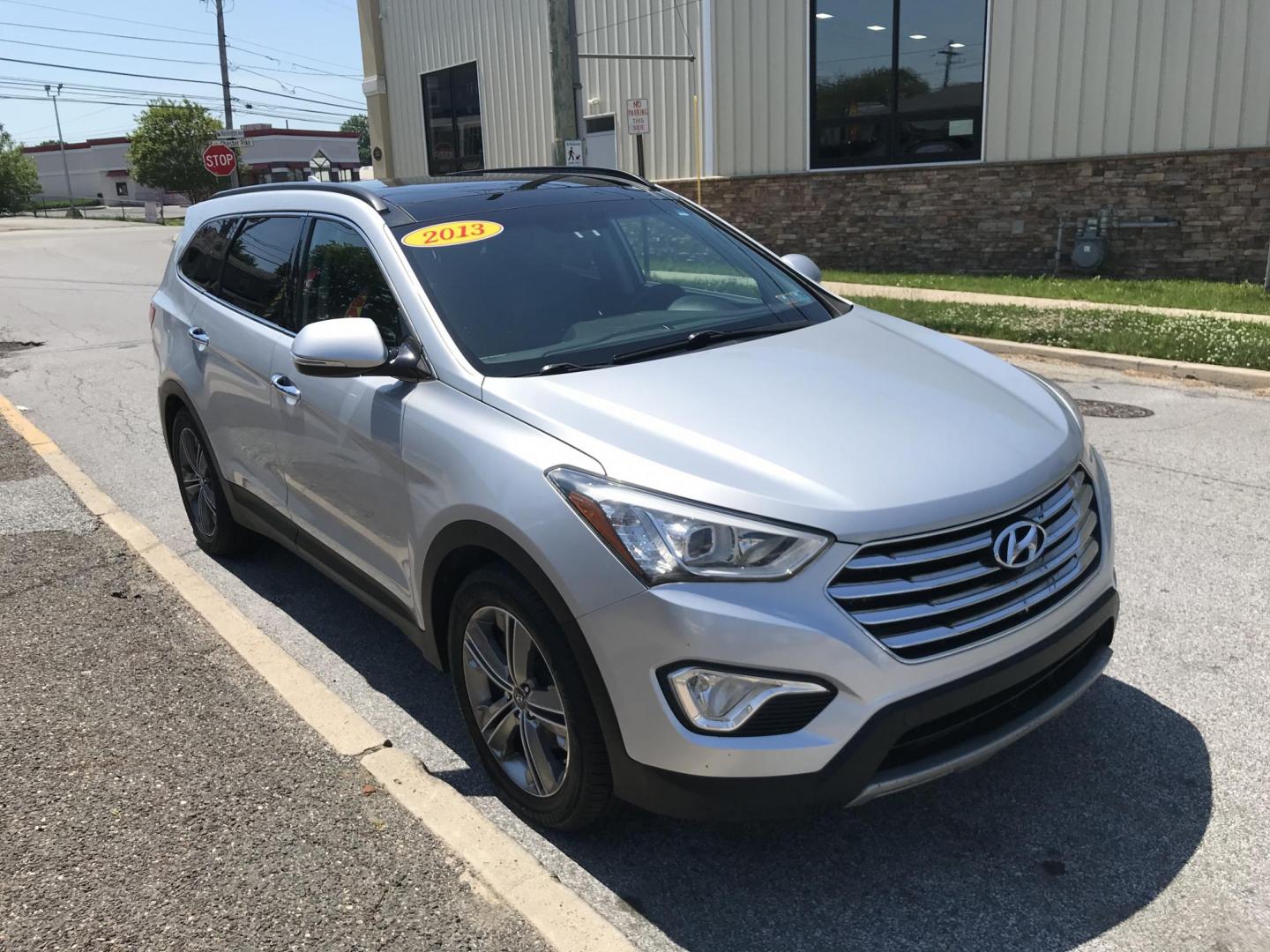 2013 Silver /Gray Hyundai Santa Fe Limited FWD (KM8SR4HF8DU) with an 3.3L V6 DOHC 24V engine, 6-Speed Automatic transmission, located at 577 Chester Pike, Prospect Park, PA, 19076, (610) 237-1015, 39.886154, -75.302338 - 2013 Hyundai Santa Fe LIMITED: Only 100k miles, 3rd row seat, sunroof, backup camera, navigation system, new PA inspection, SUPER CLEAN, runs LIKE NEW! This vehicle comes inspected and has been given a bumper to bumper safety check. It is very clean, reliable, and well maintained. We offer a uniq - Photo#3