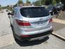 2013 Silver /Gray Hyundai Santa Fe Limited FWD (KM8SR4HF8DU) with an 3.3L V6 DOHC 24V engine, 6-Speed Automatic transmission, located at 577 Chester Pike, Prospect Park, PA, 19076, (610) 237-1015, 39.886154, -75.302338 - 2013 Hyundai Santa Fe LIMITED: Only 100k miles, 3rd row seat, sunroof, backup camera, navigation system, new PA inspection, SUPER CLEAN, runs LIKE NEW! This vehicle comes inspected and has been given a bumper to bumper safety check. It is very clean, reliable, and well maintained. We offer a uniq - Photo#5