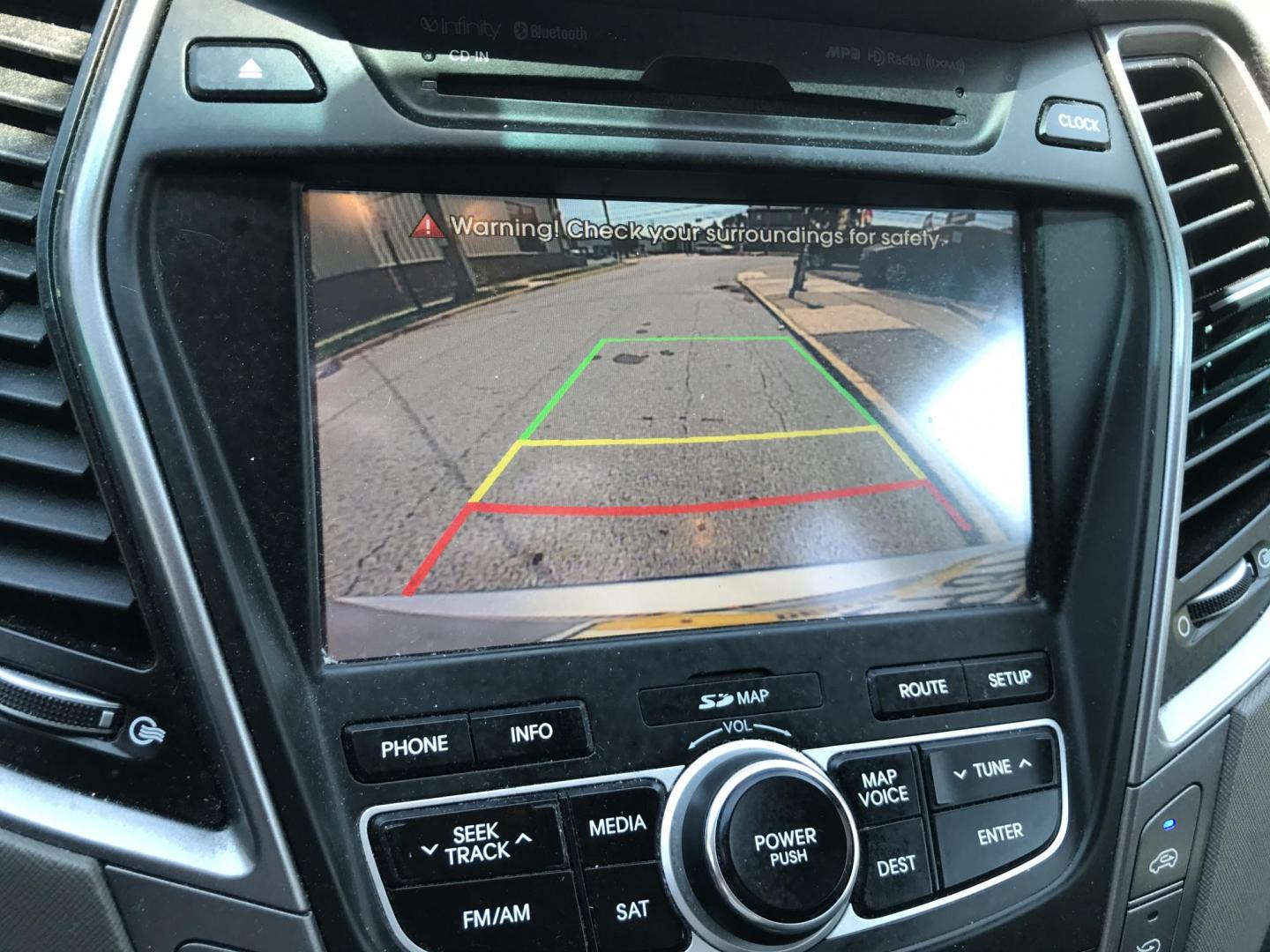 2013 Silver /Gray Hyundai Santa Fe Limited FWD (KM8SR4HF8DU) with an 3.3L V6 DOHC 24V engine, 6-Speed Automatic transmission, located at 577 Chester Pike, Prospect Park, PA, 19076, (610) 237-1015, 39.886154, -75.302338 - 2013 Hyundai Santa Fe LIMITED: Only 100k miles, 3rd row seat, sunroof, backup camera, navigation system, new PA inspection, SUPER CLEAN, runs LIKE NEW! This vehicle comes inspected and has been given a bumper to bumper safety check. It is very clean, reliable, and well maintained. We offer a uniq - Photo#18