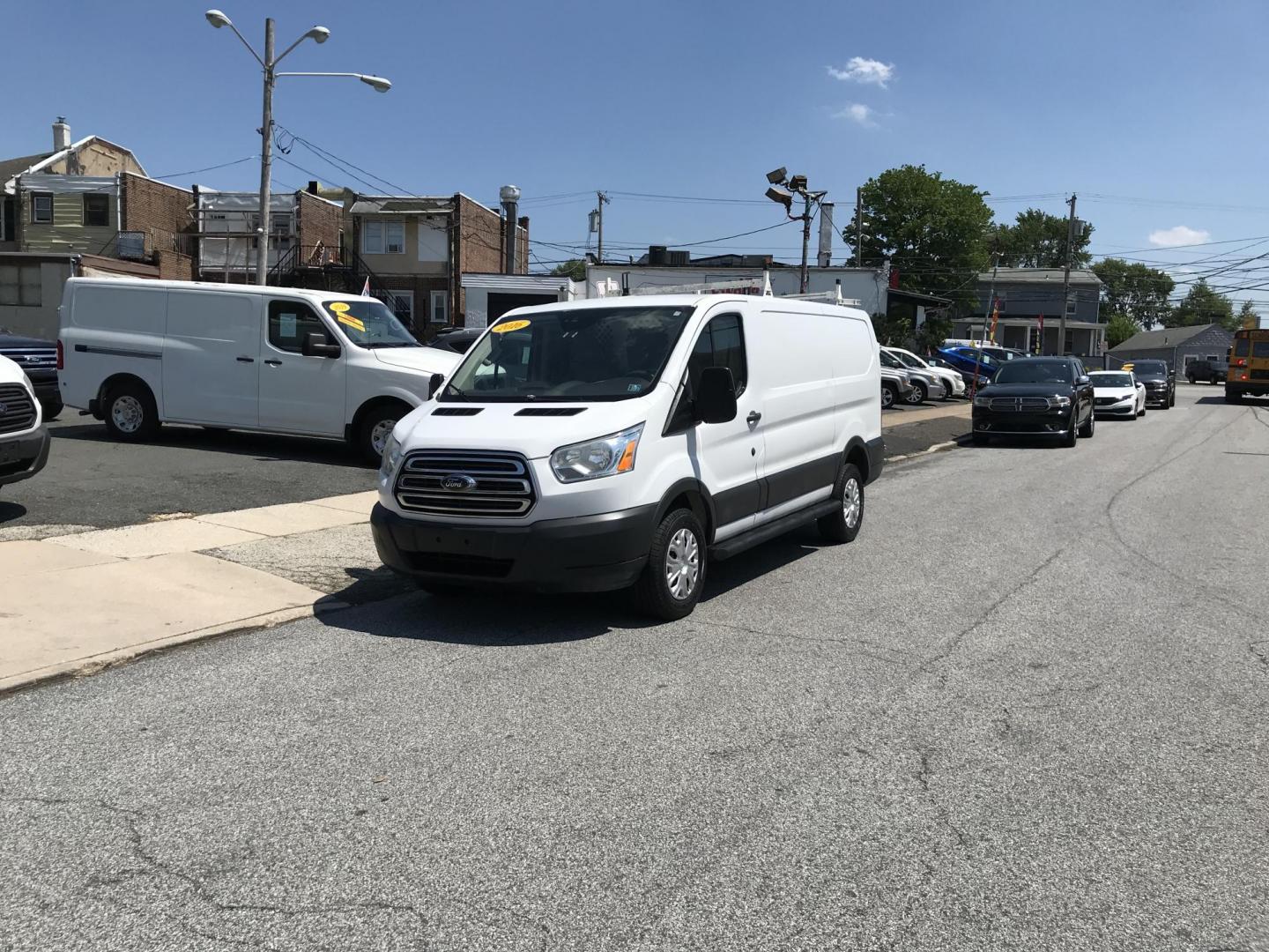 2016 White /Gray Ford Transit 250 Van Low Roof 60/40 Pass.130-in. WB (1FTYR1ZMXGK) with an 3.7L V6 DOHC 24V engine, 6A transmission, located at 577 Chester Pike, Prospect Park, PA, 19076, (610) 237-1015, 39.886154, -75.302338 - 2016 Ford Transit 250: Ladder racks, shelving, backup camera, partition, new PA inspection, FLEET MAINTAINED! This vehicle comes inspected and has been given a bumper to bumper safety check. It is very clean, reliable, and well maintained. We offer a unique pay plan that is known for being the e - Photo#1