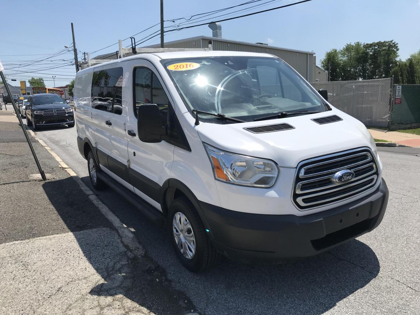 2016 White /Gray Ford Transit 250 Van Low Roof 60/40 Pass.130-in. WB (1FTYR1ZMXGK) with an 3.7L V6 DOHC 24V engine, 6A transmission, located at 577 Chester Pike, Prospect Park, PA, 19076, (610) 237-1015, 39.886154, -75.302338 - 2016 Ford Transit 250: Ladder racks, shelving, backup camera, partition, new PA inspection, FLEET MAINTAINED! This vehicle comes inspected and has been given a bumper to bumper safety check. It is very clean, reliable, and well maintained. We offer a unique pay plan that is known for being the e - Photo#3