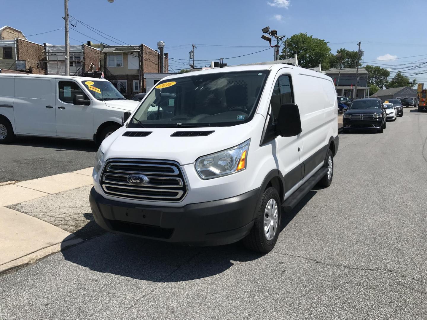 2016 White /Gray Ford Transit 250 Van Low Roof 60/40 Pass.130-in. WB (1FTYR1ZMXGK) with an 3.7L V6 DOHC 24V engine, 6A transmission, located at 577 Chester Pike, Prospect Park, PA, 19076, (610) 237-1015, 39.886154, -75.302338 - 2016 Ford Transit 250: Ladder racks, shelving, backup camera, partition, new PA inspection, FLEET MAINTAINED! This vehicle comes inspected and has been given a bumper to bumper safety check. It is very clean, reliable, and well maintained. We offer a unique pay plan that is known for being the e - Photo#2