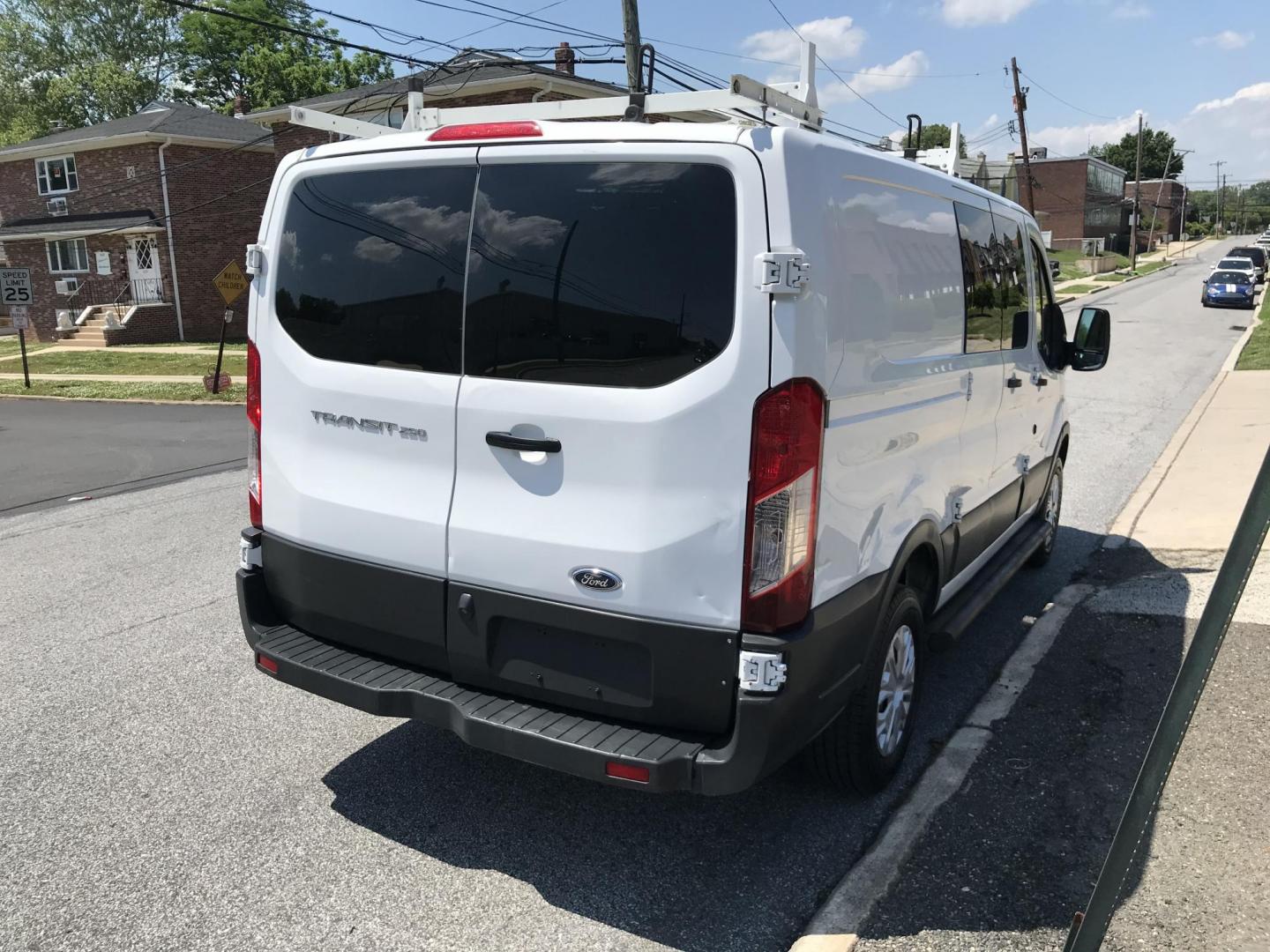 2016 White /Gray Ford Transit 250 Van Low Roof 60/40 Pass.130-in. WB (1FTYR1ZMXGK) with an 3.7L V6 DOHC 24V engine, 6A transmission, located at 577 Chester Pike, Prospect Park, PA, 19076, (610) 237-1015, 39.886154, -75.302338 - 2016 Ford Transit 250: Ladder racks, shelving, backup camera, partition, new PA inspection, FLEET MAINTAINED! This vehicle comes inspected and has been given a bumper to bumper safety check. It is very clean, reliable, and well maintained. We offer a unique pay plan that is known for being the e - Photo#4