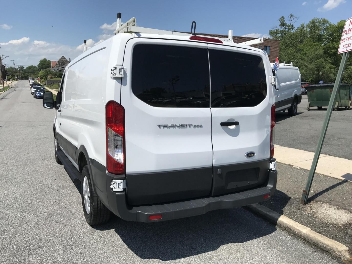 2016 White /Gray Ford Transit 250 Van Low Roof 60/40 Pass.130-in. WB (1FTYR1ZMXGK) with an 3.7L V6 DOHC 24V engine, 6A transmission, located at 577 Chester Pike, Prospect Park, PA, 19076, (610) 237-1015, 39.886154, -75.302338 - 2016 Ford Transit 250: Ladder racks, shelving, backup camera, partition, new PA inspection, FLEET MAINTAINED! This vehicle comes inspected and has been given a bumper to bumper safety check. It is very clean, reliable, and well maintained. We offer a unique pay plan that is known for being the e - Photo#5