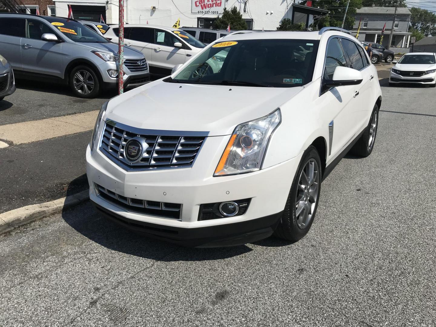 2016 White /Beige Cadillac SRX Premium Collection (3GYFNDE39GS) with an 3.6L V6 DOHC 24V FFV engine, 6A transmission, located at 577 Chester Pike, Prospect Park, PA, 19076, (610) 237-1015, 39.886154, -75.302338 - 2016 Cadillac SRX: Big sunroof, navigation system, backup camera, new PA inspection, SUPER CLEAN, runs LIKE NEW! This vehicle comes inspected and has been given a bumper to bumper safety check. It is very clean, reliable, and well maintained. We offer a unique pay plan that is known for being the - Photo#2