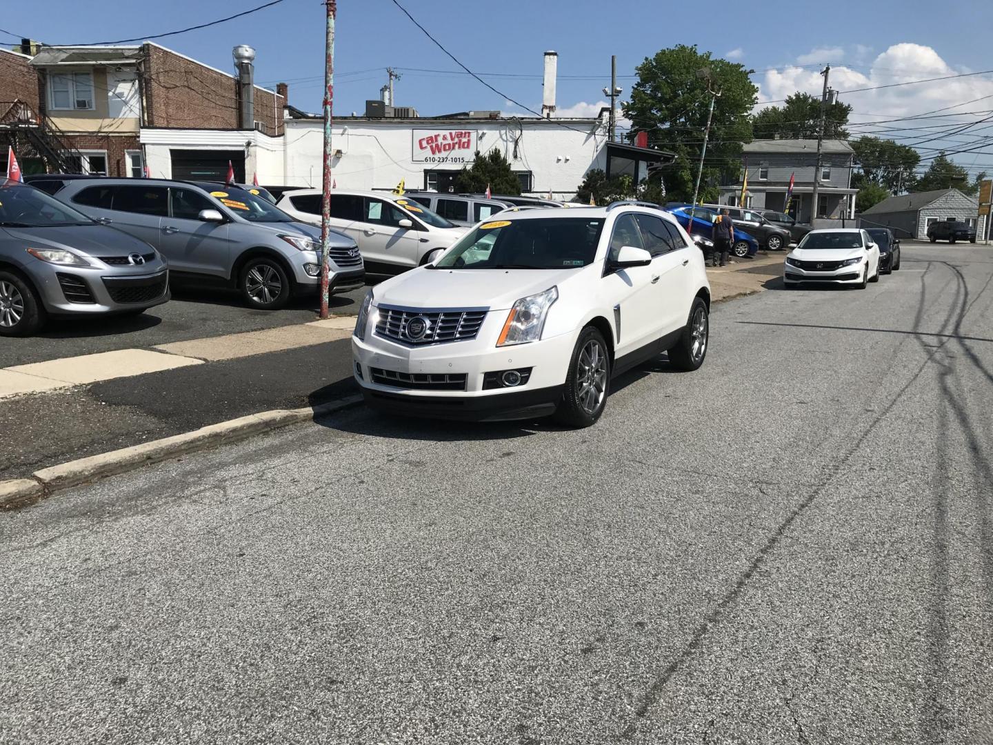 2016 White /Beige Cadillac SRX Premium Collection (3GYFNDE39GS) with an 3.6L V6 DOHC 24V FFV engine, 6A transmission, located at 577 Chester Pike, Prospect Park, PA, 19076, (610) 237-1015, 39.886154, -75.302338 - 2016 Cadillac SRX: Big sunroof, navigation system, backup camera, new PA inspection, SUPER CLEAN, runs LIKE NEW! This vehicle comes inspected and has been given a bumper to bumper safety check. It is very clean, reliable, and well maintained. We offer a unique pay plan that is known for being the - Photo#1