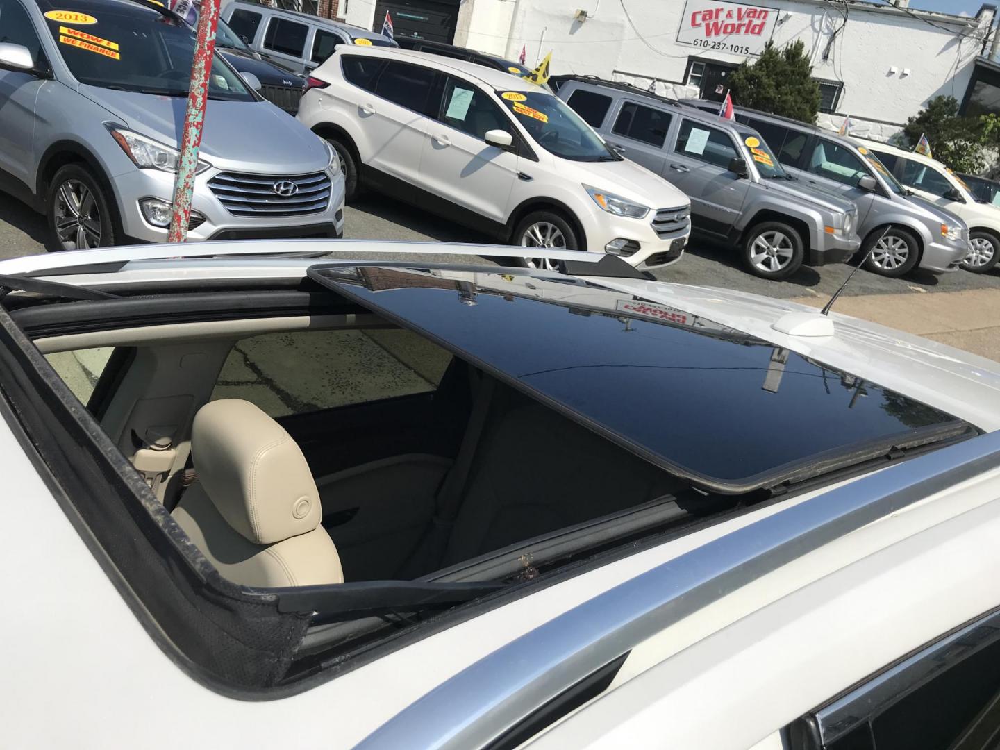 2016 White /Beige Cadillac SRX Premium Collection (3GYFNDE39GS) with an 3.6L V6 DOHC 24V FFV engine, 6A transmission, located at 577 Chester Pike, Prospect Park, PA, 19076, (610) 237-1015, 39.886154, -75.302338 - 2016 Cadillac SRX: Big sunroof, navigation system, backup camera, new PA inspection, SUPER CLEAN, runs LIKE NEW! This vehicle comes inspected and has been given a bumper to bumper safety check. It is very clean, reliable, and well maintained. We offer a unique pay plan that is known for being the - Photo#8