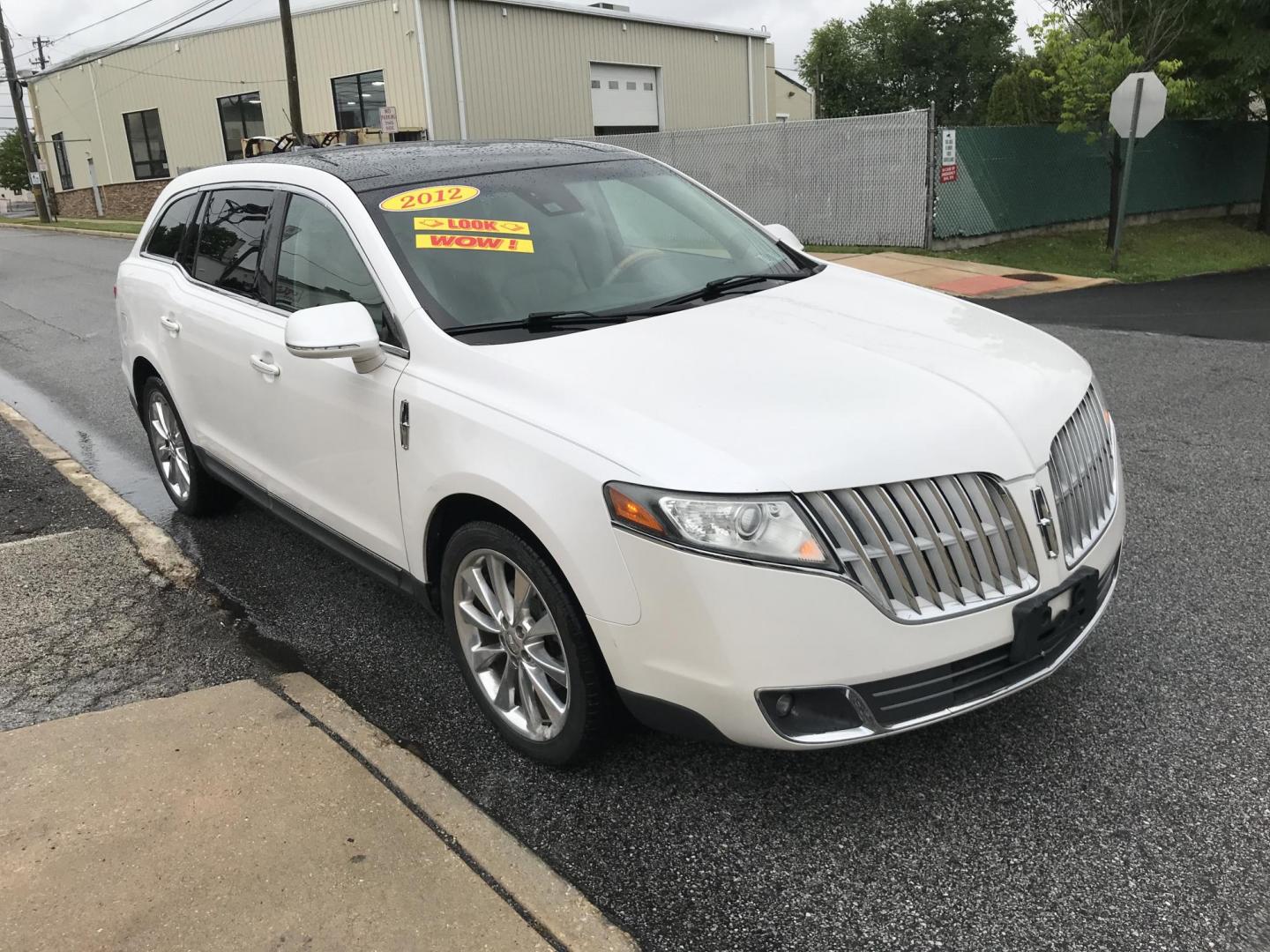 2012 White /Beige Lincoln MKT 3.5L with EcoBoost AWD (2LMHJ5AT6CB) with an 3.5L V6 DOHC 24V TURBO engine, 6-Speed Automatic transmission, located at 577 Chester Pike, Prospect Park, PA, 19076, (610) 237-1015, 39.886154, -75.302338 - 2012 Lincoln MKT: 3rd row seating, navigation system, backup camera, sunroof, AWD, new PA inspection, SUPER CLEAN, runs LIKE NEW! This vehicle comes inspected and has been given a bumper to bumper safety check. It is very clean, reliable, and well maintained. We offer a unique pay plan that is kn - Photo#3