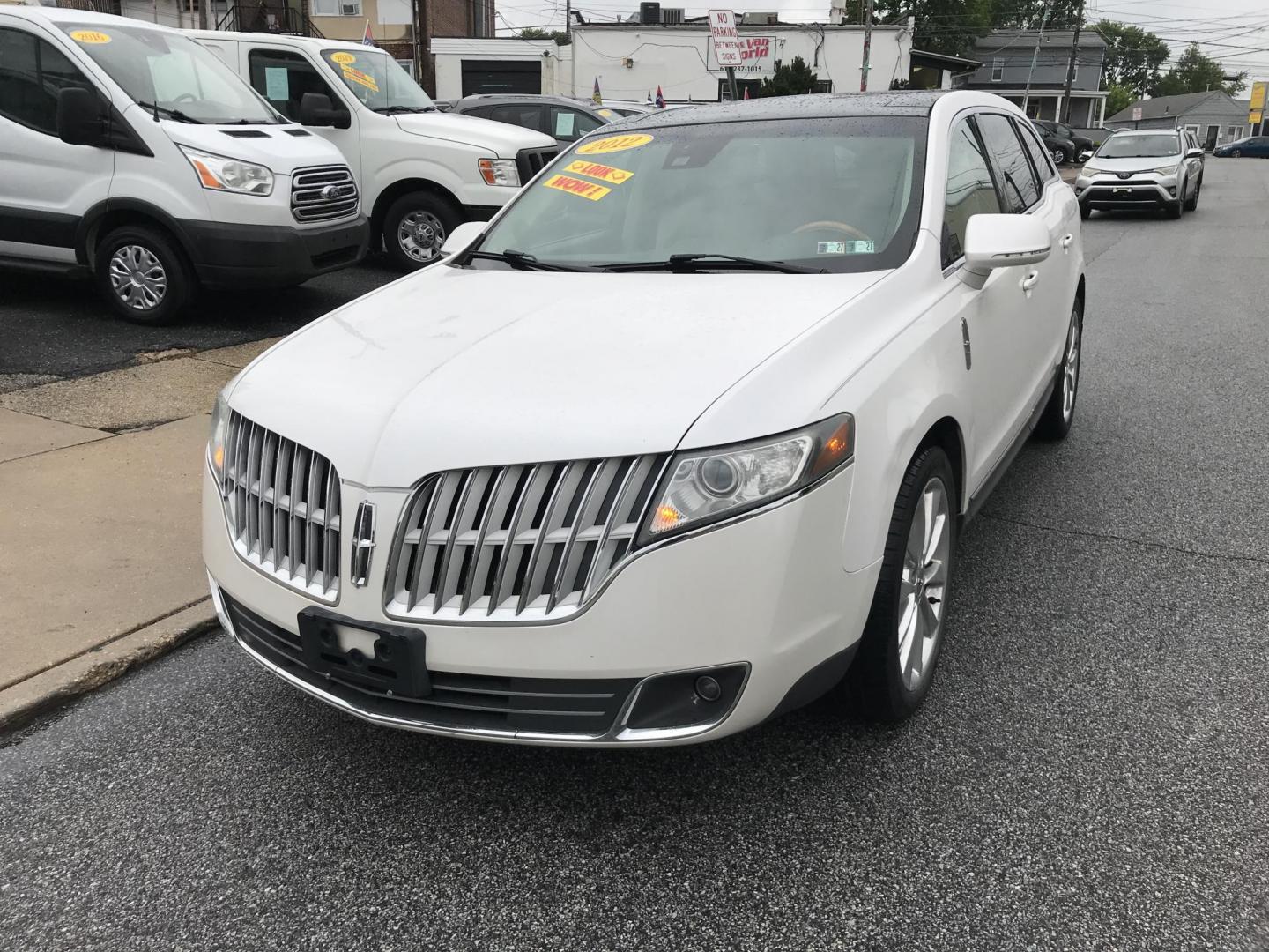 2012 White /Beige Lincoln MKT 3.5L with EcoBoost AWD (2LMHJ5AT6CB) with an 3.5L V6 DOHC 24V TURBO engine, 6-Speed Automatic transmission, located at 577 Chester Pike, Prospect Park, PA, 19076, (610) 237-1015, 39.886154, -75.302338 - 2012 Lincoln MKT: 3rd row seating, navigation system, backup camera, sunroof, AWD, new PA inspection, SUPER CLEAN, runs LIKE NEW! This vehicle comes inspected and has been given a bumper to bumper safety check. It is very clean, reliable, and well maintained. We offer a unique pay plan that is kn - Photo#2