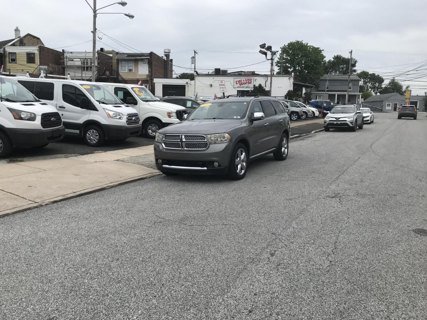 2012 Gray /Black Dodge Durango Citadel AWD (1C4SDJET7CC) with an 5.7L V8 OHV 16V engine, 5-Speed Automatic transmission, located at 577 Chester Pike, Prospect Park, PA, 19076, (610) 237-1015, 39.886154, -75.302338 - 2012 Dodge Durango Citadel: 3rd row seating, 4x4, backup camera, navigation system, DVD player, sunroof, new inspection, SUPER CLEAN, runs LIKE NEW! This vehicle comes inspected and has been given a bumper to bumper safety check. It is very clean, reliable, and well maintained. We offer a unique - Photo#1