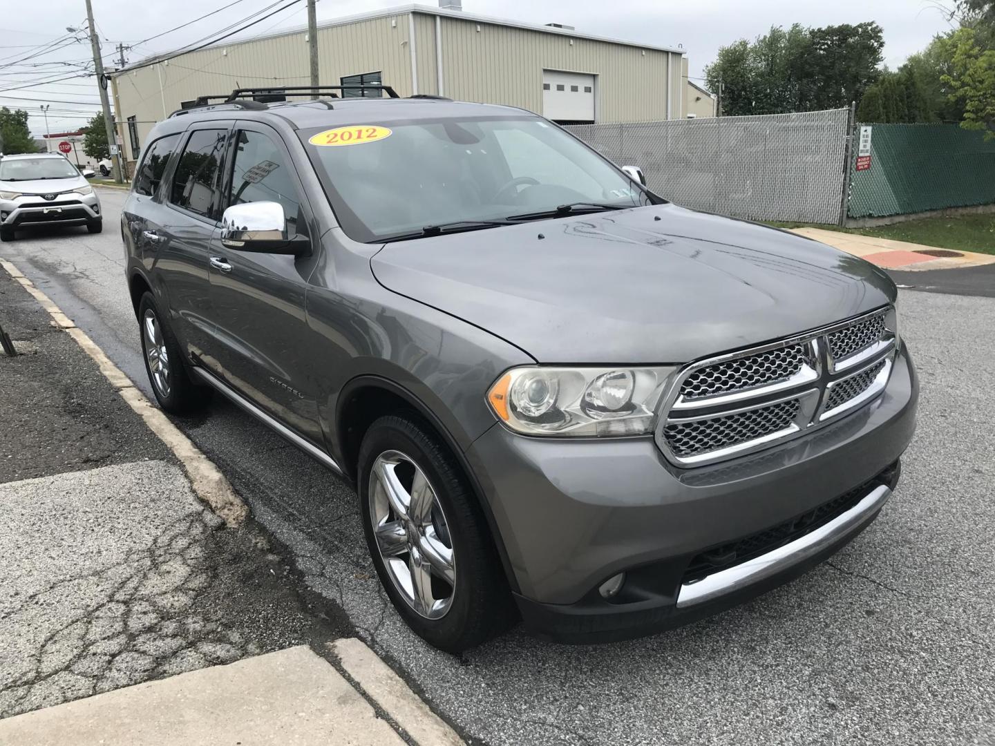 2012 Gray /Black Dodge Durango Citadel AWD (1C4SDJET7CC) with an 5.7L V8 OHV 16V engine, 5-Speed Automatic transmission, located at 577 Chester Pike, Prospect Park, PA, 19076, (610) 237-1015, 39.886154, -75.302338 - 2012 Dodge Durango Citadel: 3rd row seating, 4x4, backup camera, navigation system, DVD player, sunroof, new inspection, SUPER CLEAN, runs LIKE NEW! This vehicle comes inspected and has been given a bumper to bumper safety check. It is very clean, reliable, and well maintained. We offer a unique - Photo#3