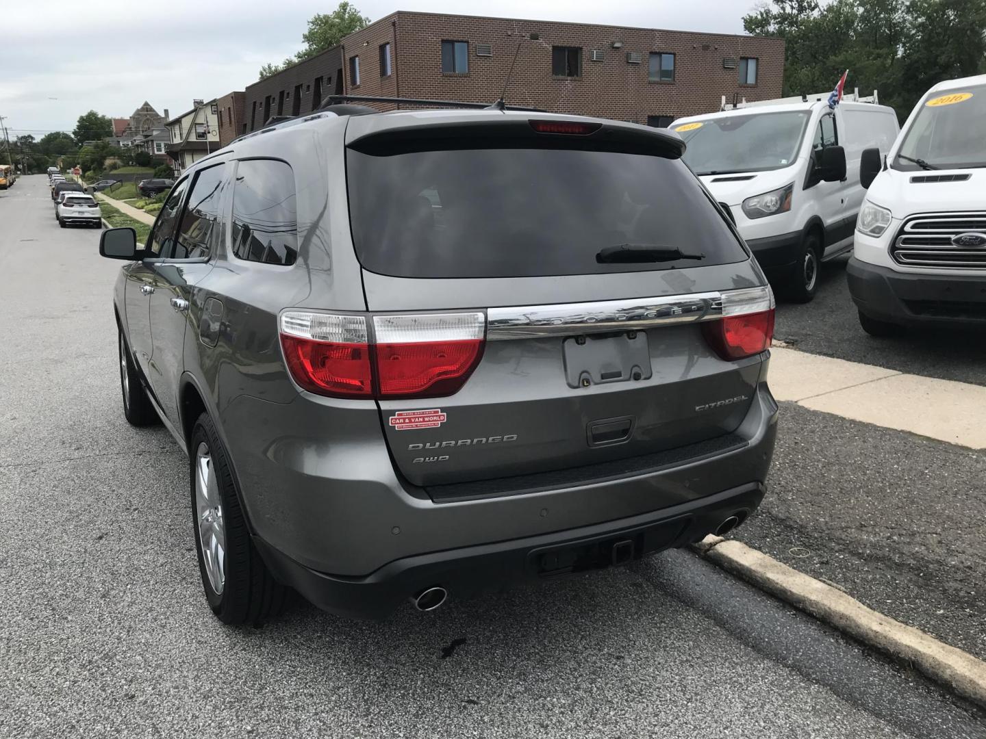2012 Gray /Black Dodge Durango Citadel AWD (1C4SDJET7CC) with an 5.7L V8 OHV 16V engine, 5-Speed Automatic transmission, located at 577 Chester Pike, Prospect Park, PA, 19076, (610) 237-1015, 39.886154, -75.302338 - 2012 Dodge Durango Citadel: 3rd row seating, 4x4, backup camera, navigation system, DVD player, sunroof, new inspection, SUPER CLEAN, runs LIKE NEW! This vehicle comes inspected and has been given a bumper to bumper safety check. It is very clean, reliable, and well maintained. We offer a unique - Photo#5
