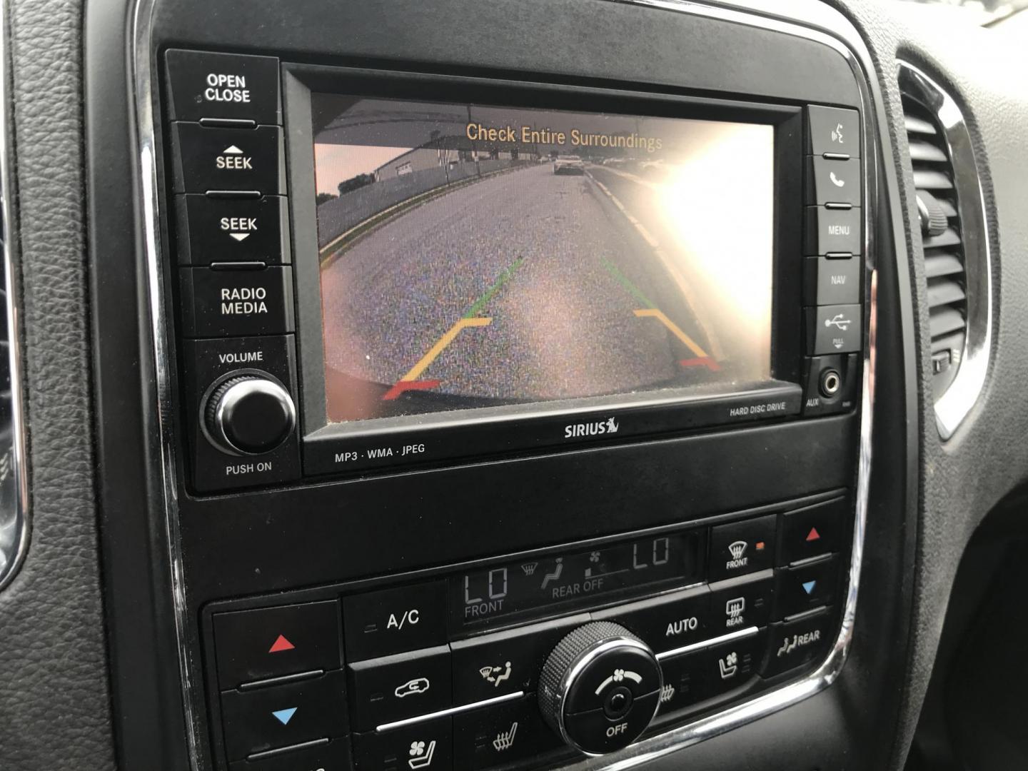 2012 Gray /Black Dodge Durango Citadel AWD (1C4SDJET7CC) with an 5.7L V8 OHV 16V engine, 5-Speed Automatic transmission, located at 577 Chester Pike, Prospect Park, PA, 19076, (610) 237-1015, 39.886154, -75.302338 - 2012 Dodge Durango Citadel: 3rd row seating, 4x4, backup camera, navigation system, DVD player, sunroof, new inspection, SUPER CLEAN, runs LIKE NEW! This vehicle comes inspected and has been given a bumper to bumper safety check. It is very clean, reliable, and well maintained. We offer a unique - Photo#16