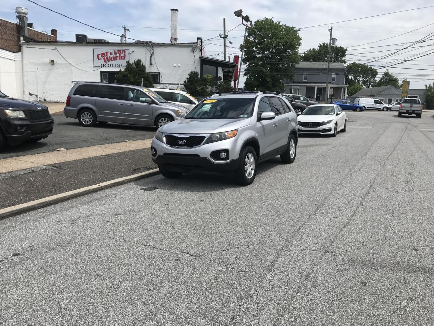 2011 Silver /Gray Kia Sorento LX 4WD (5XYKTCA18BG) with an 2.4L L4 DOHC 16V engine, 6-Speed Automatic transmission, located at 577 Chester Pike, Prospect Park, PA, 19076, (610) 237-1015, 39.886154, -75.302338 - 2011 Kia Sorento LX: Only 77k miles, 4x4, backup camera, new PA inspection, SUPER CLEAN, runs LIKE NEW! This vehicle comes inspected and has been given a bumper to bumper safety check. It is very clean, reliable, and well maintained. We offer a unique pay plan that is known for being the easiest - Photo#1