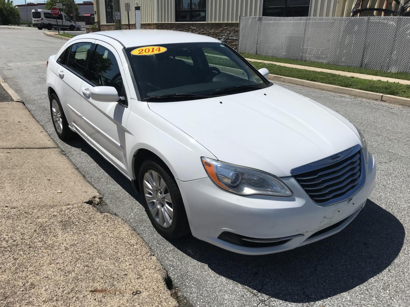 2014 White /Beige Chrysler 200 LX (1C3CCBAB9EN) with an 2.4L L4 DOHC 16V engine, 6-Speed Automatic transmission, located at 577 Chester Pike, Prospect Park, PA, 19076, (610) 237-1015, 39.886154, -75.302338 - 2014 Chrysler 200 LX: Only 102k miles, great on gas, new PA inspection, SUPER CLEAN, runs LIKE NEW! This vehicle comes inspected and has been given a bumper to bumper safety check. It is very clean, reliable, and well maintained. We offer a unique pay plan that is known for being the easiest and - Photo#3