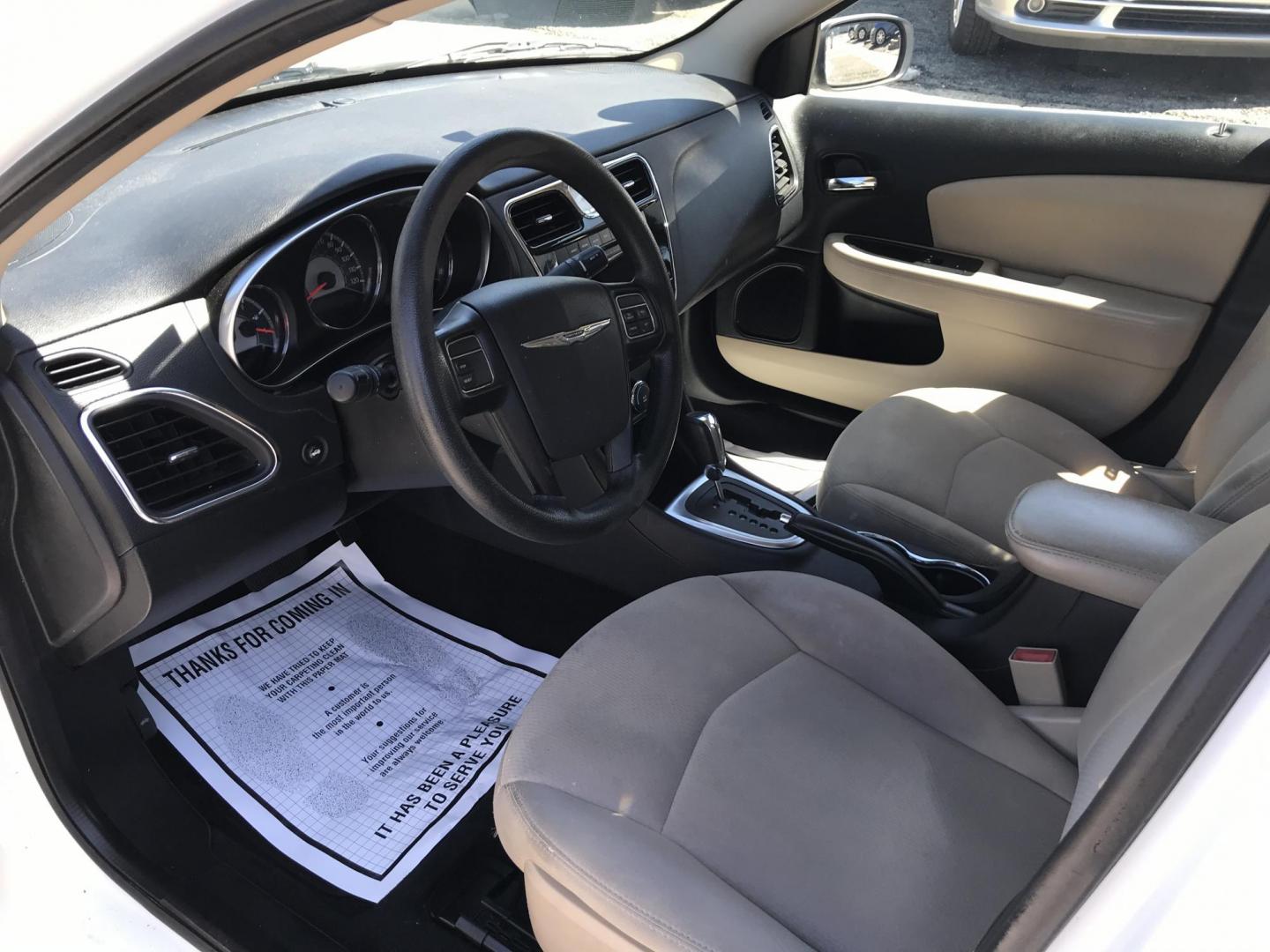 2014 White /Beige Chrysler 200 LX (1C3CCBAB9EN) with an 2.4L L4 DOHC 16V engine, 6-Speed Automatic transmission, located at 577 Chester Pike, Prospect Park, PA, 19076, (610) 237-1015, 39.886154, -75.302338 - 2014 Chrysler 200 LX: Only 102k miles, great on gas, new PA inspection, SUPER CLEAN, runs LIKE NEW! This vehicle comes inspected and has been given a bumper to bumper safety check. It is very clean, reliable, and well maintained. We offer a unique pay plan that is known for being the easiest and - Photo#7