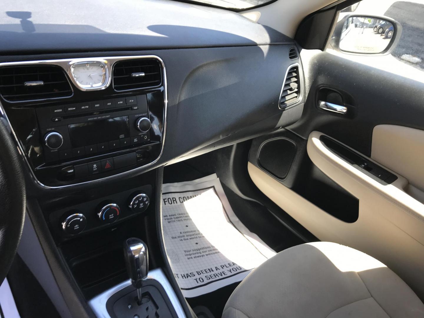2014 White /Beige Chrysler 200 LX (1C3CCBAB9EN) with an 2.4L L4 DOHC 16V engine, 6-Speed Automatic transmission, located at 577 Chester Pike, Prospect Park, PA, 19076, (610) 237-1015, 39.886154, -75.302338 - 2014 Chrysler 200 LX: Only 102k miles, great on gas, new PA inspection, SUPER CLEAN, runs LIKE NEW! This vehicle comes inspected and has been given a bumper to bumper safety check. It is very clean, reliable, and well maintained. We offer a unique pay plan that is known for being the easiest and - Photo#13