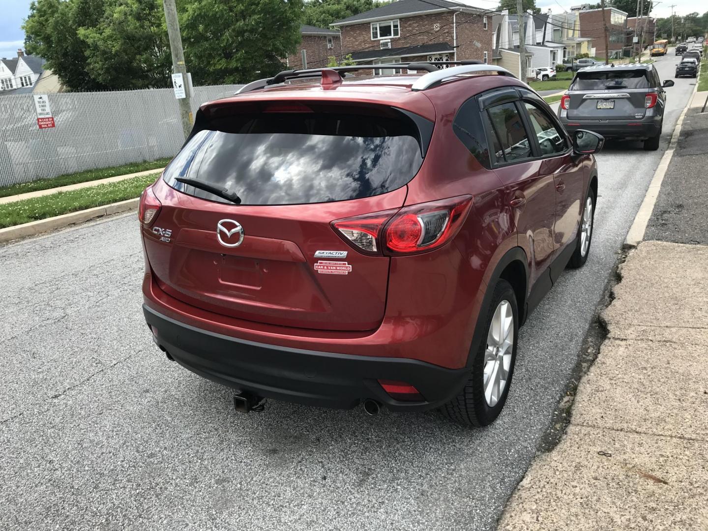 2013 Red /Tan Mazda CX-5 Grand Touring AWD (JM3KE4DE1D0) with an 2.0 V4 engine, 6-Speed Automatic transmission, located at 577 Chester Pike, Prospect Park, PA, 19076, (610) 237-1015, 39.886154, -75.302338 - 2013 Mazda CX-5 Grand Touring: AWD, navigation system, sunroof, backup camera, new PA inspection, SUPER CLEAN, runs LIKE NEW! This vehicle comes inspected and has been given a bumper to bumper safety check. It is very clean, reliable, and well maintained. We offer a unique pay plan that is known - Photo#4