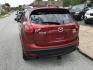 2013 Red /Tan Mazda CX-5 Grand Touring AWD (JM3KE4DE1D0) with an 2.0 V4 engine, 6-Speed Automatic transmission, located at 577 Chester Pike, Prospect Park, PA, 19076, (610) 237-1015, 39.886154, -75.302338 - 2013 Mazda CX-5 Grand Touring: AWD, navigation system, sunroof, backup camera, new PA inspection, SUPER CLEAN, runs LIKE NEW! This vehicle comes inspected and has been given a bumper to bumper safety check. It is very clean, reliable, and well maintained. We offer a unique pay plan that is known - Photo#5