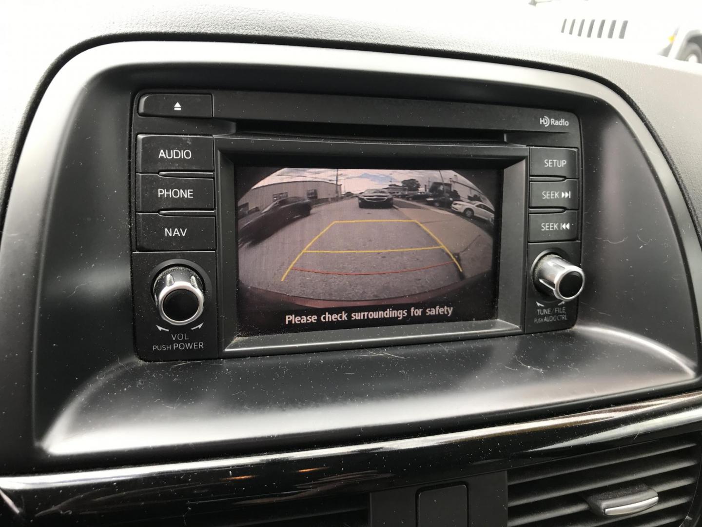 2013 Red /Tan Mazda CX-5 Grand Touring AWD (JM3KE4DE1D0) with an 2.0 V4 engine, 6-Speed Automatic transmission, located at 577 Chester Pike, Prospect Park, PA, 19076, (610) 237-1015, 39.886154, -75.302338 - 2013 Mazda CX-5 Grand Touring: AWD, navigation system, sunroof, backup camera, new PA inspection, SUPER CLEAN, runs LIKE NEW! This vehicle comes inspected and has been given a bumper to bumper safety check. It is very clean, reliable, and well maintained. We offer a unique pay plan that is known - Photo#16