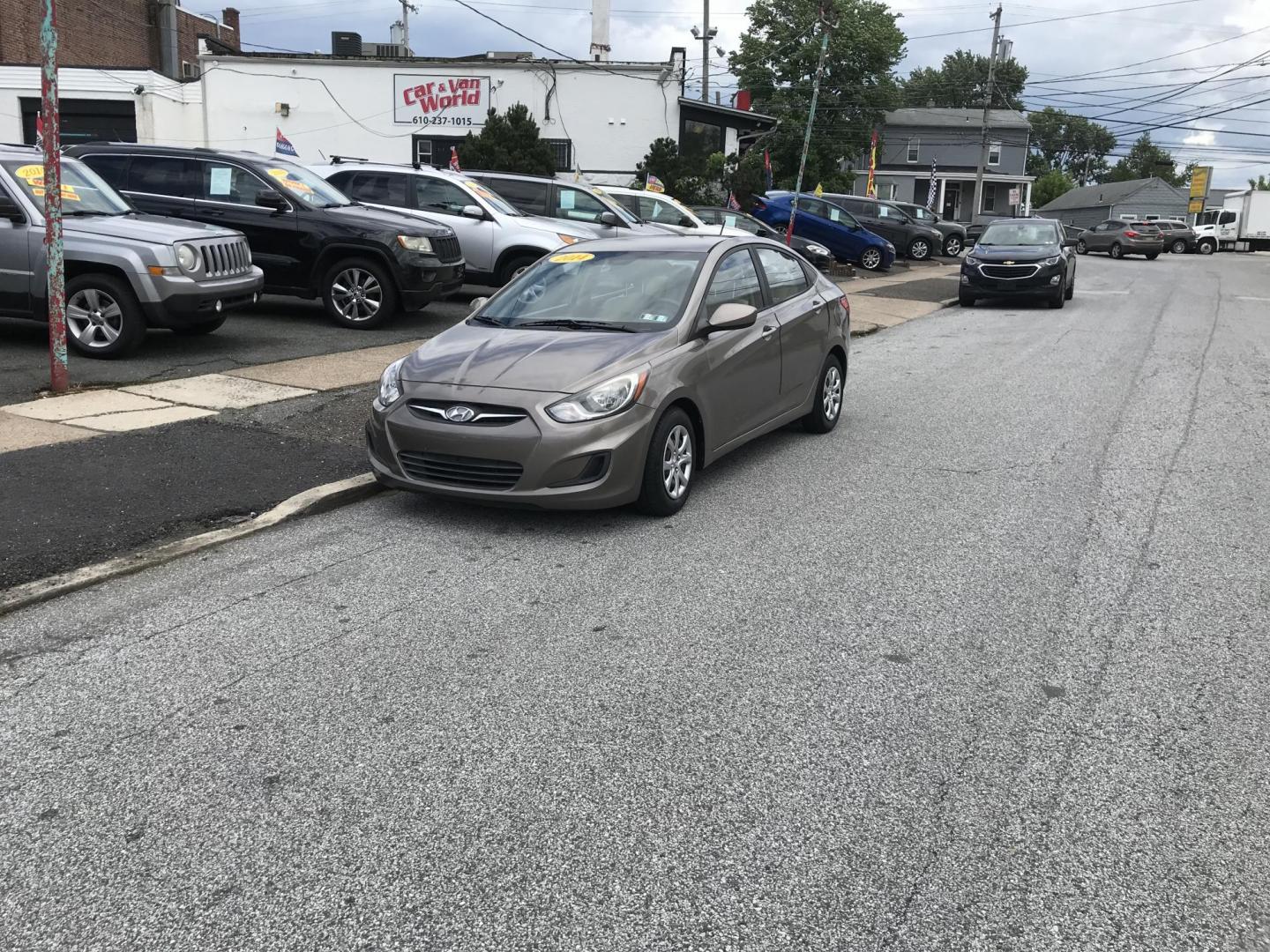 2014 Gold /Tan Hyundai Accent GLS 4-Door (KMHCT4AE6EU) with an 1.6L L4 DOHC 16V engine, Automatic transmission, located at 577 Chester Pike, Prospect Park, PA, 19076, (610) 237-1015, 39.886154, -75.302338 - 2014 Hyundai Accent: Great on gas, new PA inspection, runs EXCELLENT! This vehicle comes inspected and has been given a bumper to bumper safety check. It is very clean, reliable, and well maintained. We offer a unique pay plan that is known for being the easiest and fastest financing option in th - Photo#1