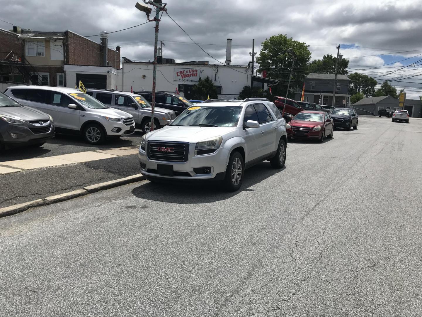2016 Silver /Black GMC Acadia SLT-1 AWD (1GKKVRKDXGJ) with an 3.6L V6 DOHC 24V engine, 6A transmission, located at 577 Chester Pike, Prospect Park, PA, 19076, (610) 237-1015, 39.886154, -75.302338 - 2016 GMC Acadia SLT: AWD, 3rd row, navigation system, backup camera, sunroof, new PA inspection, runs LIKE NEW! This vehicle comes inspected and has been given a bumper to bumper safety check. It is very clean, reliable, and well maintained. We offer a unique pay plan that is known for being the - Photo#1