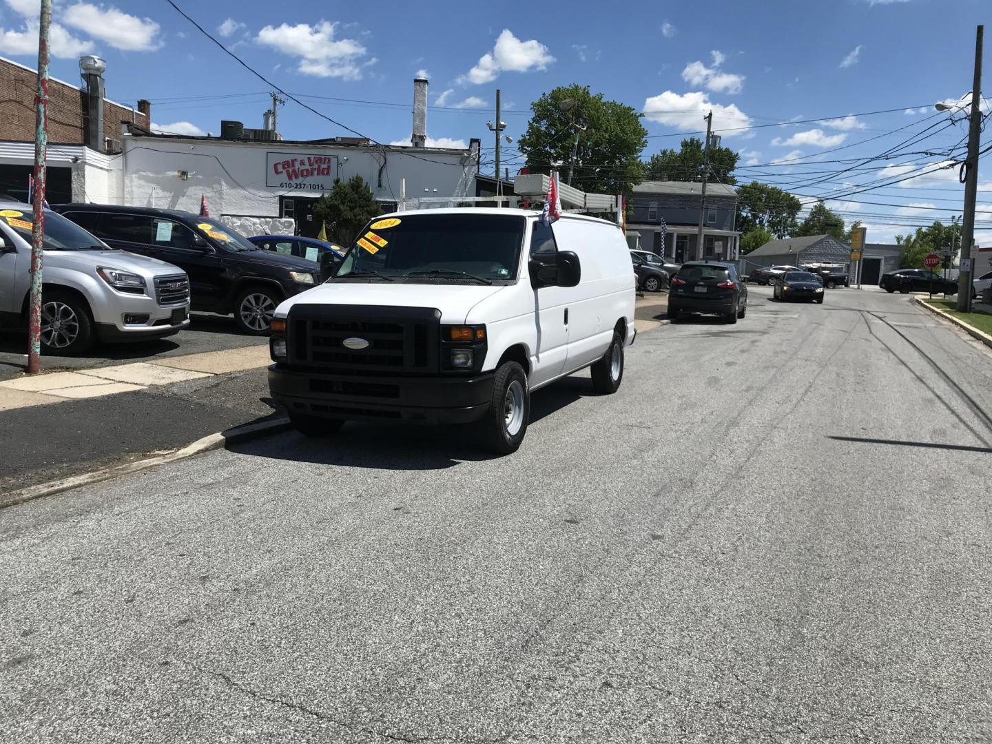 2014 White /Gray Ford E-Series Van E-350 Super Duty (1FTSE3EL4ED) with an 5.4L V8 SOHC 16V FFV engine, 4-Speed Automatic transmission, located at 577 Chester Pike, Prospect Park, PA, 19076, (610) 237-1015, 39.886154, -75.302338 - 2014 Ford Econoline E350: Only 139k miles, ladder racks, shelving, no side or rear windows, partition, new PA inspection, RUNS LIKE NEW! This vehicle comes inspected and has been given a bumper to bumper safety check. It is very clean, reliable, and well maintained. We offer a unique pay plan tha - Photo#1