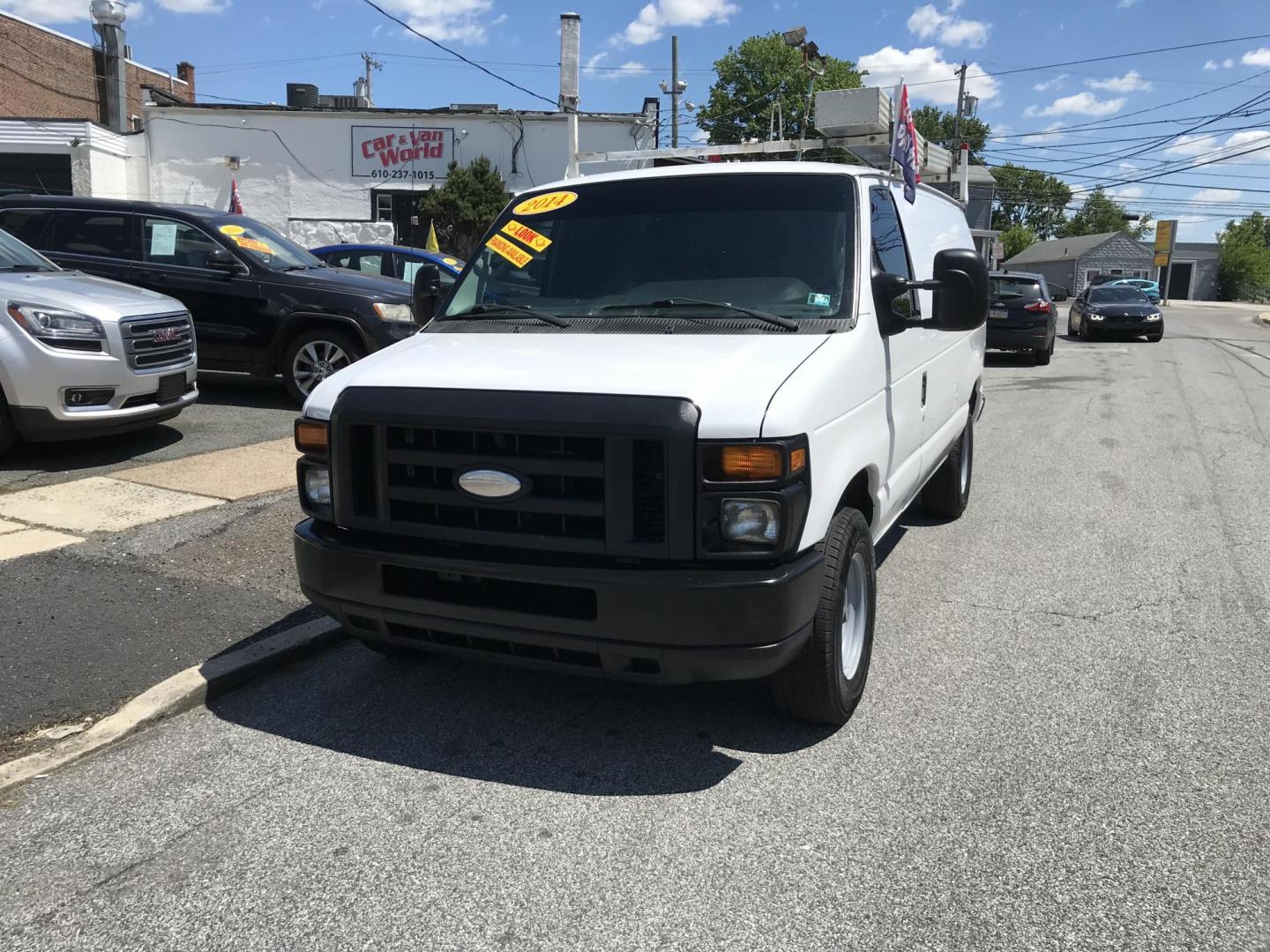 2014 White /Gray Ford E-Series Van E-350 Super Duty (1FTSE3EL4ED) with an 5.4L V8 SOHC 16V FFV engine, 4-Speed Automatic transmission, located at 577 Chester Pike, Prospect Park, PA, 19076, (610) 237-1015, 39.886154, -75.302338 - 2014 Ford Econoline E350: Only 139k miles, ladder racks, shelving, no side or rear windows, partition, new PA inspection, RUNS LIKE NEW! This vehicle comes inspected and has been given a bumper to bumper safety check. It is very clean, reliable, and well maintained. We offer a unique pay plan tha - Photo#2
