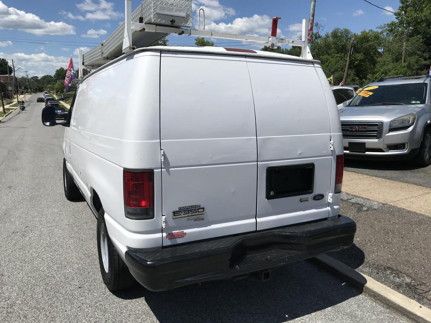 2014 White /Gray Ford E-Series Van E-350 Super Duty (1FTSE3EL4ED) with an 5.4L V8 SOHC 16V FFV engine, 4-Speed Automatic transmission, located at 577 Chester Pike, Prospect Park, PA, 19076, (610) 237-1015, 39.886154, -75.302338 - 2014 Ford Econoline E350: Only 139k miles, ladder racks, shelving, no side or rear windows, partition, new PA inspection, RUNS LIKE NEW! This vehicle comes inspected and has been given a bumper to bumper safety check. It is very clean, reliable, and well maintained. We offer a unique pay plan tha - Photo#5