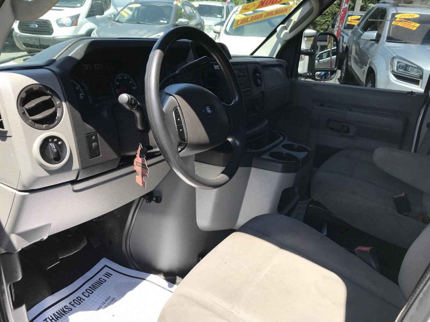 2014 White /Gray Ford E-Series Van E-350 Super Duty (1FTSE3EL4ED) with an 5.4L V8 SOHC 16V FFV engine, 4-Speed Automatic transmission, located at 577 Chester Pike, Prospect Park, PA, 19076, (610) 237-1015, 39.886154, -75.302338 - 2014 Ford Econoline E350: Only 139k miles, ladder racks, shelving, no side or rear windows, partition, new PA inspection, RUNS LIKE NEW! This vehicle comes inspected and has been given a bumper to bumper safety check. It is very clean, reliable, and well maintained. We offer a unique pay plan tha - Photo#9