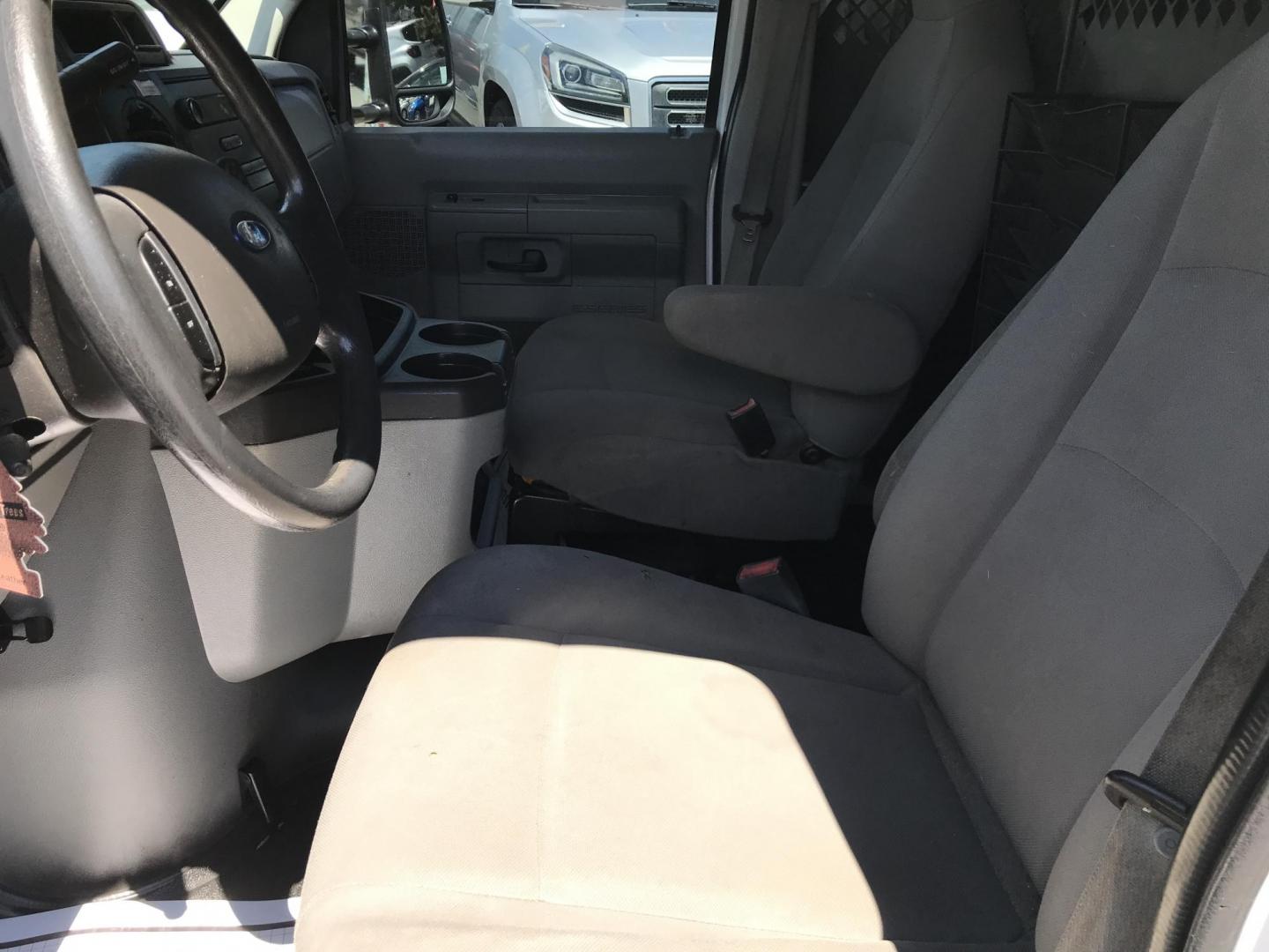 2014 White /Gray Ford E-Series Van E-350 Super Duty (1FTSE3EL4ED) with an 5.4L V8 SOHC 16V FFV engine, 4-Speed Automatic transmission, located at 577 Chester Pike, Prospect Park, PA, 19076, (610) 237-1015, 39.886154, -75.302338 - 2014 Ford Econoline E350: Only 139k miles, ladder racks, shelving, no side or rear windows, partition, new PA inspection, RUNS LIKE NEW! This vehicle comes inspected and has been given a bumper to bumper safety check. It is very clean, reliable, and well maintained. We offer a unique pay plan tha - Photo#11