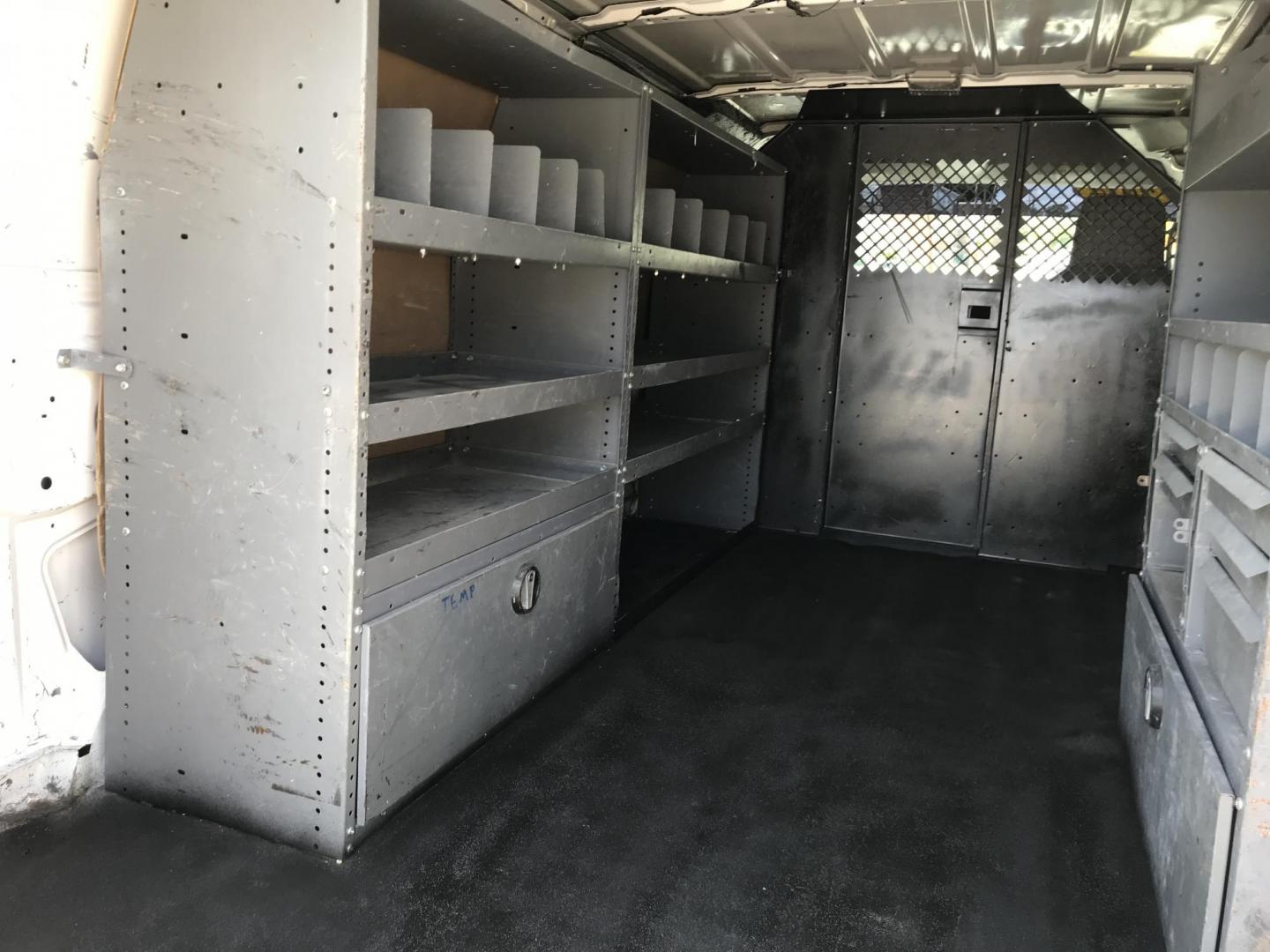 2014 White /Gray Ford E-Series Van E-350 Super Duty (1FTSE3EL4ED) with an 5.4L V8 SOHC 16V FFV engine, 4-Speed Automatic transmission, located at 577 Chester Pike, Prospect Park, PA, 19076, (610) 237-1015, 39.886154, -75.302338 - 2014 Ford Econoline E350: Only 139k miles, ladder racks, shelving, no side or rear windows, partition, new PA inspection, RUNS LIKE NEW! This vehicle comes inspected and has been given a bumper to bumper safety check. It is very clean, reliable, and well maintained. We offer a unique pay plan tha - Photo#18