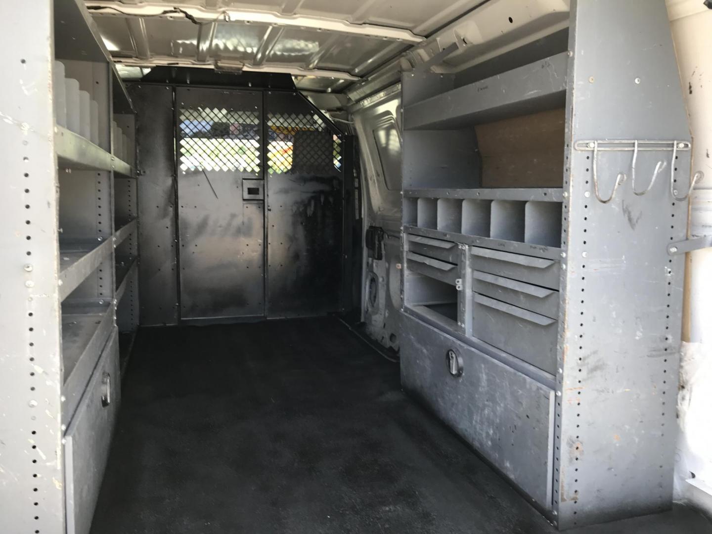 2014 White /Gray Ford E-Series Van E-350 Super Duty (1FTSE3EL4ED) with an 5.4L V8 SOHC 16V FFV engine, 4-Speed Automatic transmission, located at 577 Chester Pike, Prospect Park, PA, 19076, (610) 237-1015, 39.886154, -75.302338 - 2014 Ford Econoline E350: Only 139k miles, ladder racks, shelving, no side or rear windows, partition, new PA inspection, RUNS LIKE NEW! This vehicle comes inspected and has been given a bumper to bumper safety check. It is very clean, reliable, and well maintained. We offer a unique pay plan tha - Photo#19