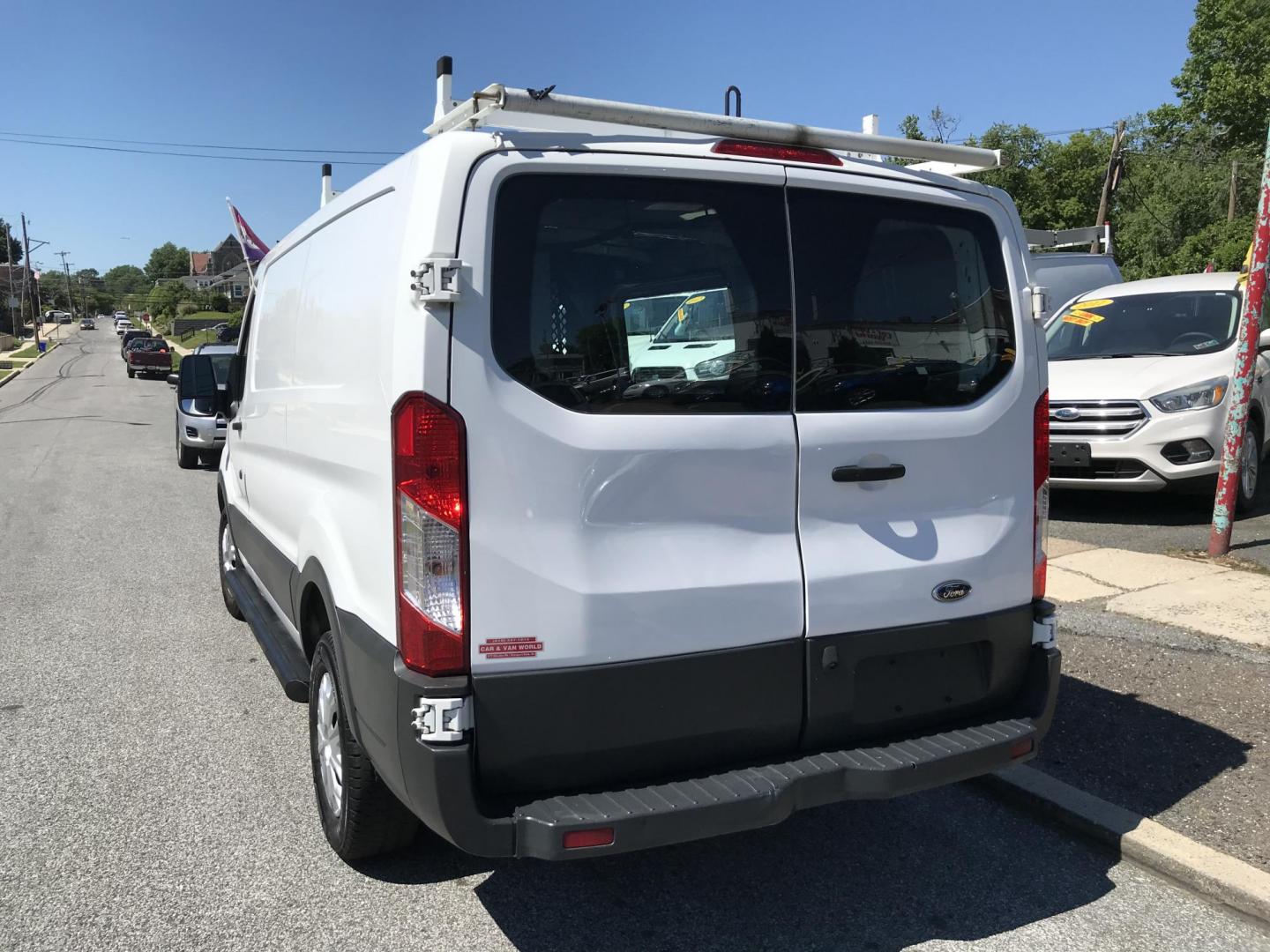 2017 White /Gray Ford Transit 250 Van Low Roof w/Sliding Pass. 130-in. WB (1FTYR1YM7HK) with an 3.7L V6 DOHC 24V engine, 6A transmission, located at 577 Chester Pike, Prospect Park, PA, 19076, (610) 237-1015, 39.886154, -75.302338 - 2017 Ford Transit 250: Ladder racks, shelving, partition, new PA inspection, FLEET MAINTAINED, runs LIKE NEW! This vehicle comes inspected and has been given a bumper to bumper safety check. It is very clean, reliable, and well maintained. We offer a unique pay plan that is known for being the ea - Photo#5