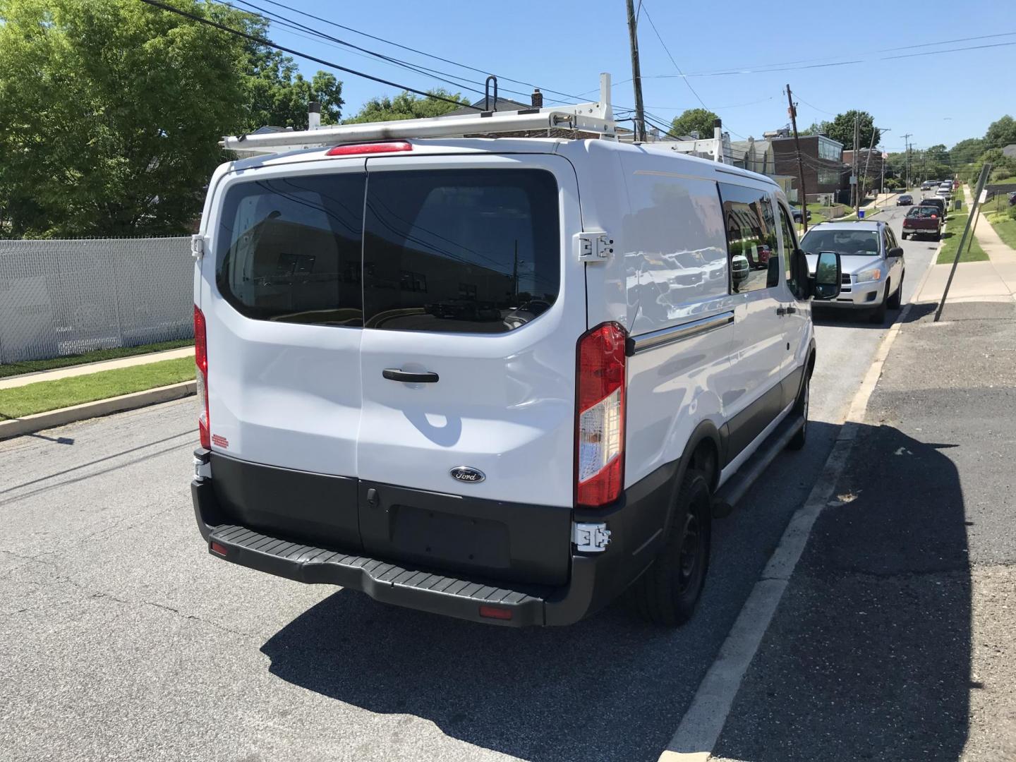 2017 White /Gray Ford Transit 250 Van Low Roof w/Sliding Pass. 130-in. WB (1FTYR1YM7HK) with an 3.7L V6 DOHC 24V engine, 6A transmission, located at 577 Chester Pike, Prospect Park, PA, 19076, (610) 237-1015, 39.886154, -75.302338 - 2017 Ford Transit 250: Ladder racks, shelving, partition, new PA inspection, FLEET MAINTAINED, runs LIKE NEW! This vehicle comes inspected and has been given a bumper to bumper safety check. It is very clean, reliable, and well maintained. We offer a unique pay plan that is known for being the ea - Photo#4