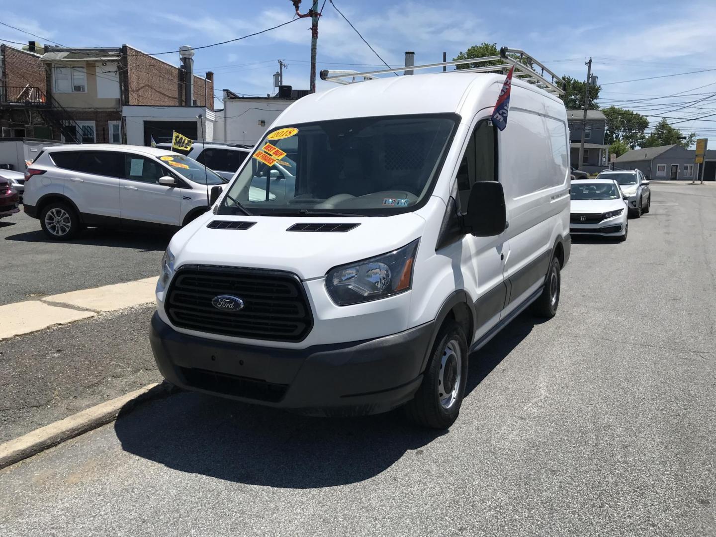 2018 White /Gray Ford Transit 250 Van Med. Roof w/Sliding Pass. 130-in. WB (1FTYR1CM8JK) with an 3.7L V6 DOHC 24V engine, 6A transmission, located at 577 Chester Pike, Prospect Park, PA, 19076, (610) 237-1015, 39.886154, -75.302338 - 2018 Ford Transit 250 Medium Roof: Ladder racks, shelving, cages over rear windows, backup camera, new PA inspection, FLEET MAINTAINED, runs LIKE NEW! This vehicle comes inspected and has been given a bumper to bumper safety check. It is very clean, reliable, and well maintained. We offer a uniqu - Photo#2