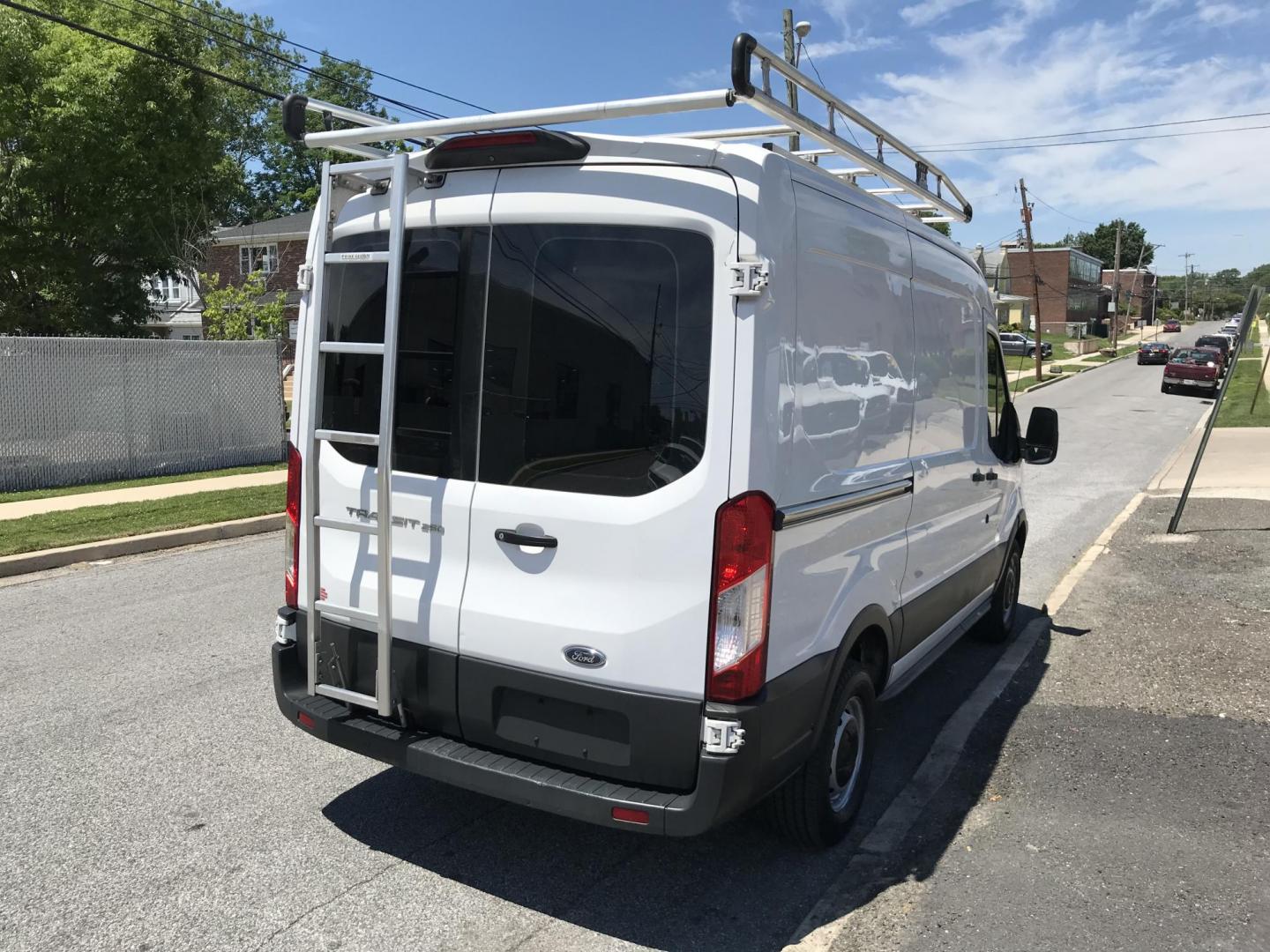 2018 White /Gray Ford Transit 250 Van Med. Roof w/Sliding Pass. 130-in. WB (1FTYR1CM8JK) with an 3.7L V6 DOHC 24V engine, 6A transmission, located at 577 Chester Pike, Prospect Park, PA, 19076, (610) 237-1015, 39.886154, -75.302338 - 2018 Ford Transit 250 Medium Roof: Ladder racks, shelving, cages over rear windows, backup camera, new PA inspection, FLEET MAINTAINED, runs LIKE NEW! This vehicle comes inspected and has been given a bumper to bumper safety check. It is very clean, reliable, and well maintained. We offer a uniqu - Photo#4
