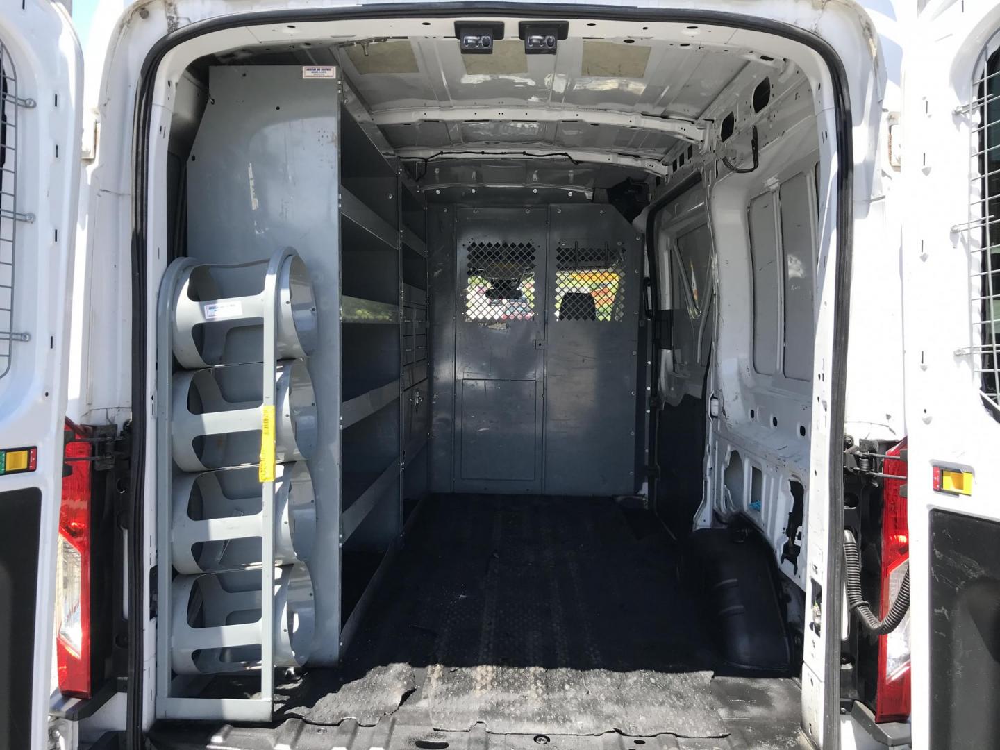 2018 White /Gray Ford Transit 250 Van Med. Roof w/Sliding Pass. 130-in. WB (1FTYR1CM8JK) with an 3.7L V6 DOHC 24V engine, 6A transmission, located at 577 Chester Pike, Prospect Park, PA, 19076, (610) 237-1015, 39.886154, -75.302338 - 2018 Ford Transit 250 Medium Roof: Ladder racks, shelving, cages over rear windows, backup camera, new PA inspection, FLEET MAINTAINED, runs LIKE NEW! This vehicle comes inspected and has been given a bumper to bumper safety check. It is very clean, reliable, and well maintained. We offer a uniqu - Photo#16