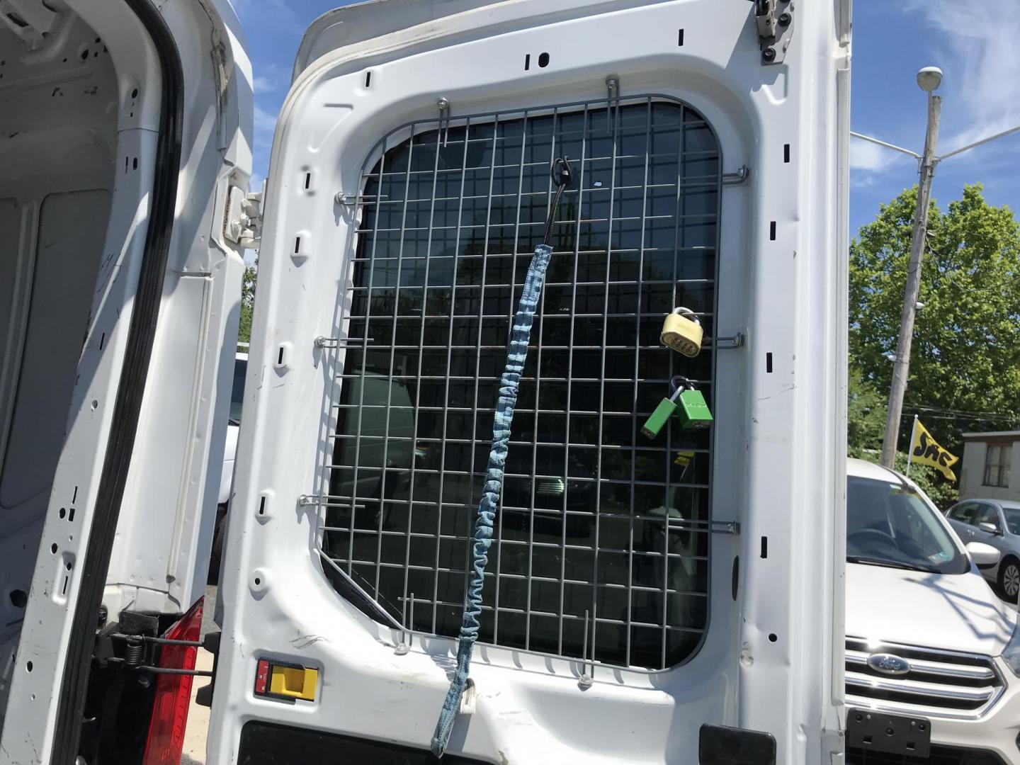 2018 White /Gray Ford Transit 250 Van Med. Roof w/Sliding Pass. 130-in. WB (1FTYR1CM8JK) with an 3.7L V6 DOHC 24V engine, 6A transmission, located at 577 Chester Pike, Prospect Park, PA, 19076, (610) 237-1015, 39.886154, -75.302338 - 2018 Ford Transit 250 Medium Roof: Ladder racks, shelving, cages over rear windows, backup camera, new PA inspection, FLEET MAINTAINED, runs LIKE NEW! This vehicle comes inspected and has been given a bumper to bumper safety check. It is very clean, reliable, and well maintained. We offer a uniqu - Photo#18