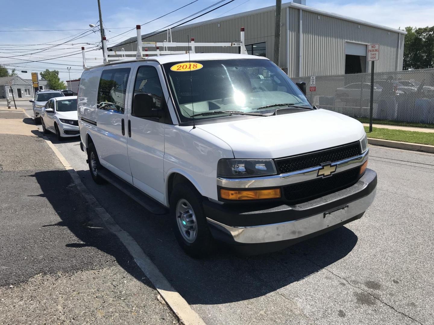 2018 White /Gray Chevrolet Express 2500 Cargo (1GCWGAFG3J1) with an 6.0L V8 OHV 16V FFV engine, 6A transmission, located at 577 Chester Pike, Prospect Park, PA, 19076, (610) 237-1015, 39.886154, -75.302338 - 2018 Chevy Express 2500 Cargo Van: Ladder racks, shelving, partition, backup camera, power locks and windows, new PA inspection, FLEET MAINTAINED, runs LIKE NEW! This vehicle comes inspected and has been given a bumper to bumper safety check. It is very clean, reliable, and well maintained. We of - Photo#3