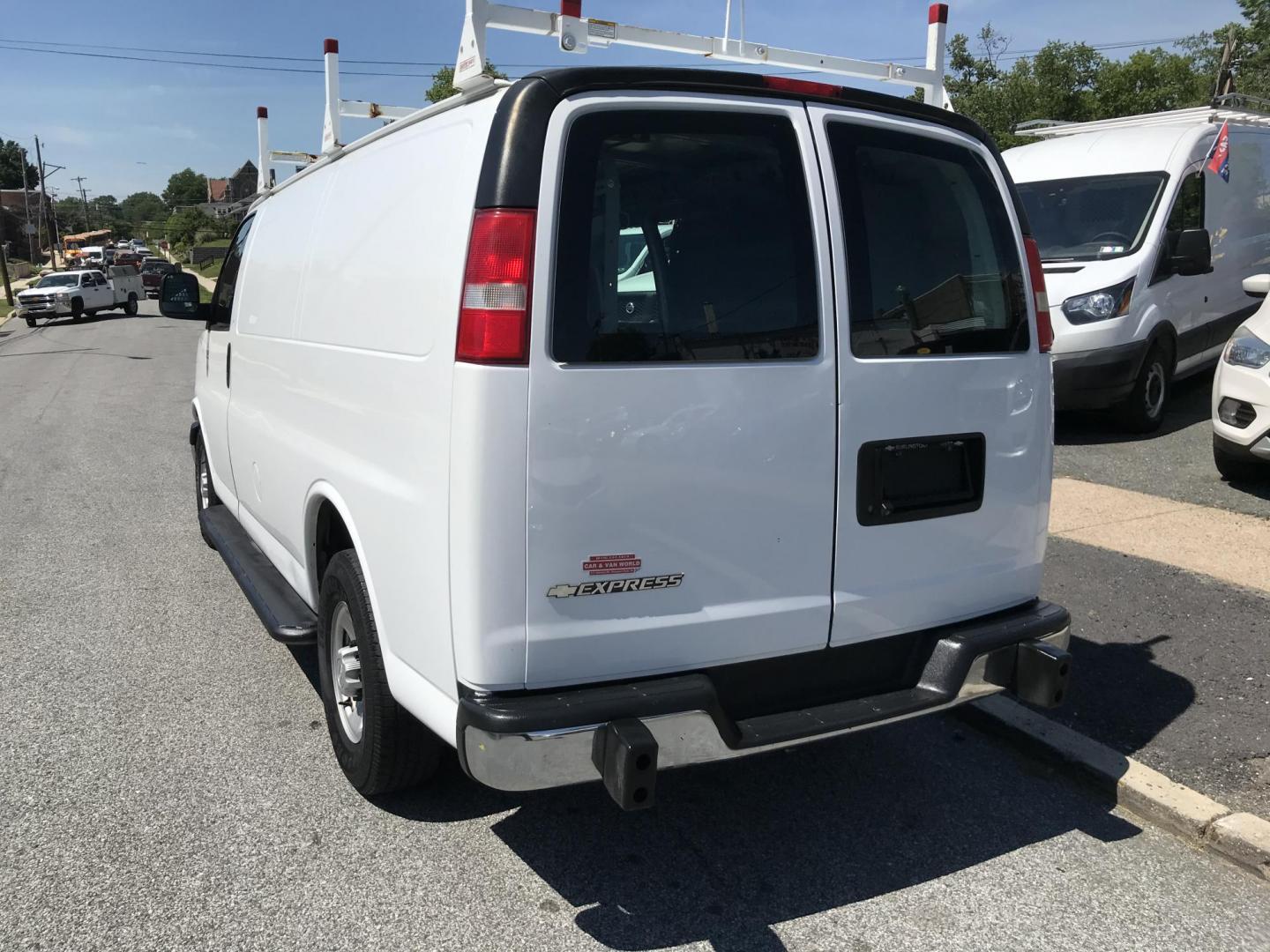 2018 White /Gray Chevrolet Express 2500 Cargo (1GCWGAFG3J1) with an 6.0L V8 OHV 16V FFV engine, 6A transmission, located at 577 Chester Pike, Prospect Park, PA, 19076, (610) 237-1015, 39.886154, -75.302338 - 2018 Chevy Express 2500 Cargo Van: Ladder racks, shelving, partition, backup camera, power locks and windows, new PA inspection, FLEET MAINTAINED, runs LIKE NEW! This vehicle comes inspected and has been given a bumper to bumper safety check. It is very clean, reliable, and well maintained. We of - Photo#5