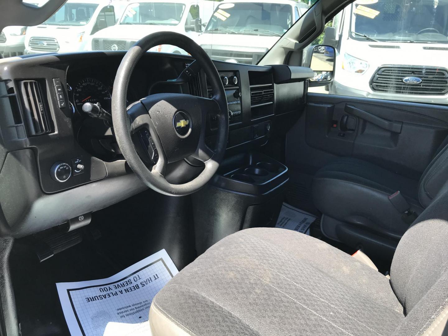 2018 White /Gray Chevrolet Express 2500 Cargo (1GCWGAFG3J1) with an 6.0L V8 OHV 16V FFV engine, 6A transmission, located at 577 Chester Pike, Prospect Park, PA, 19076, (610) 237-1015, 39.886154, -75.302338 - 2018 Chevy Express 2500 Cargo Van: Ladder racks, shelving, partition, backup camera, power locks and windows, new PA inspection, FLEET MAINTAINED, runs LIKE NEW! This vehicle comes inspected and has been given a bumper to bumper safety check. It is very clean, reliable, and well maintained. We of - Photo#7