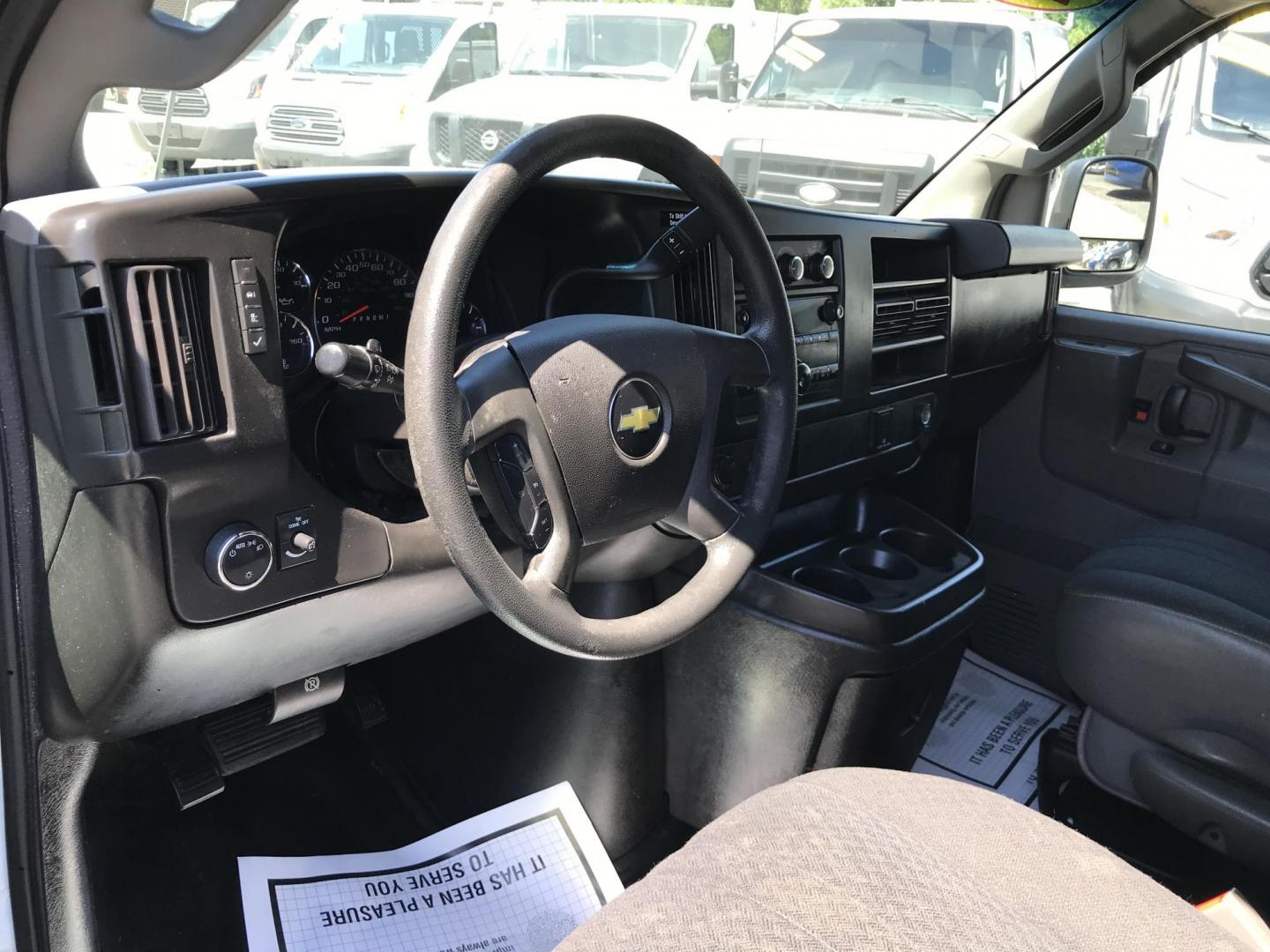 2018 White /Gray Chevrolet Express 2500 Cargo (1GCWGAFG3J1) with an 6.0L V8 OHV 16V FFV engine, 6A transmission, located at 577 Chester Pike, Prospect Park, PA, 19076, (610) 237-1015, 39.886154, -75.302338 - 2018 Chevy Express 2500 Cargo Van: Ladder racks, shelving, partition, backup camera, power locks and windows, new PA inspection, FLEET MAINTAINED, runs LIKE NEW! This vehicle comes inspected and has been given a bumper to bumper safety check. It is very clean, reliable, and well maintained. We of - Photo#11