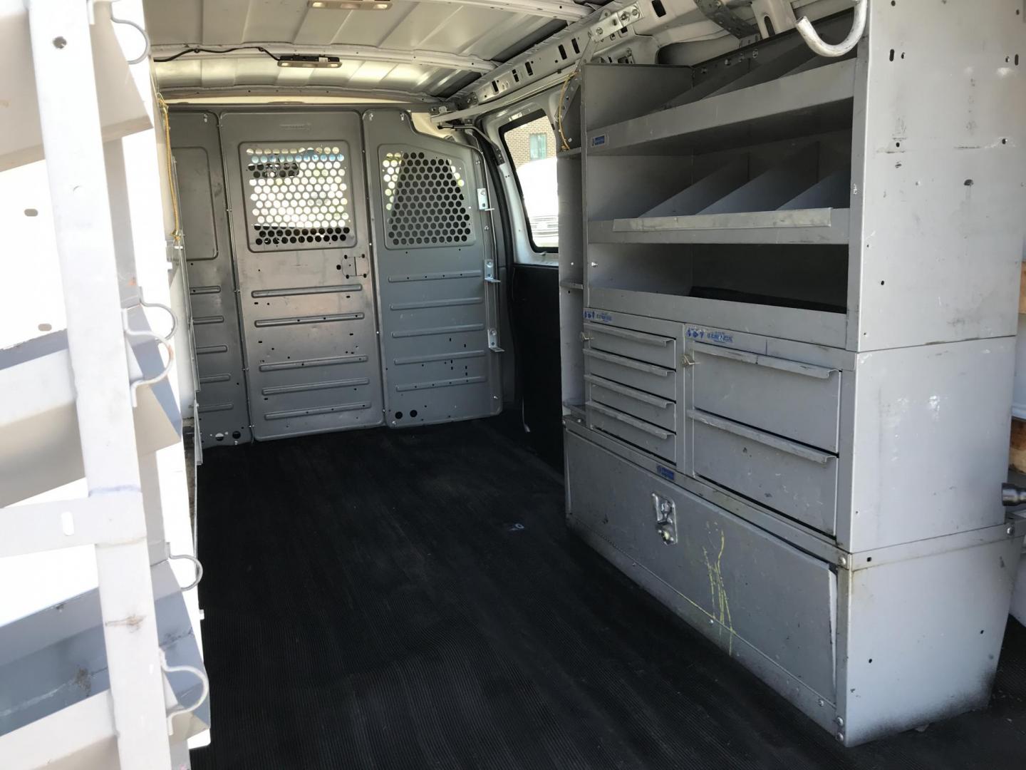 2018 White /Gray Chevrolet Express 2500 Cargo (1GCWGAFG3J1) with an 6.0L V8 OHV 16V FFV engine, 6A transmission, located at 577 Chester Pike, Prospect Park, PA, 19076, (610) 237-1015, 39.886154, -75.302338 - 2018 Chevy Express 2500 Cargo Van: Ladder racks, shelving, partition, backup camera, power locks and windows, new PA inspection, FLEET MAINTAINED, runs LIKE NEW! This vehicle comes inspected and has been given a bumper to bumper safety check. It is very clean, reliable, and well maintained. We of - Photo#17